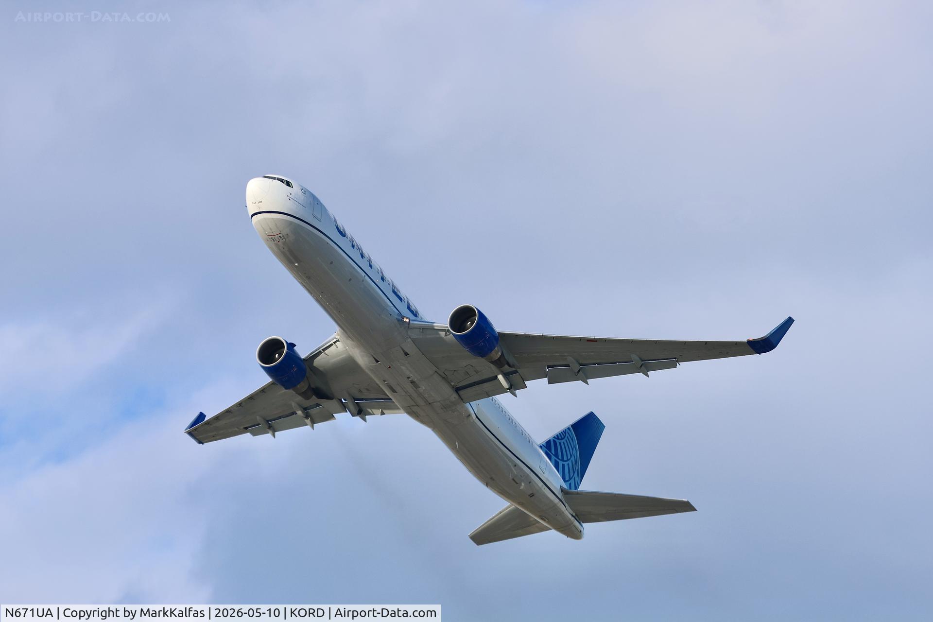 Aircraft N671UA, 1999 Boeing 767-322, c/n 30026, B763 United Boeing 767-322 N671UA departing 28R KORD, at KORD, photo by MarkKalfas