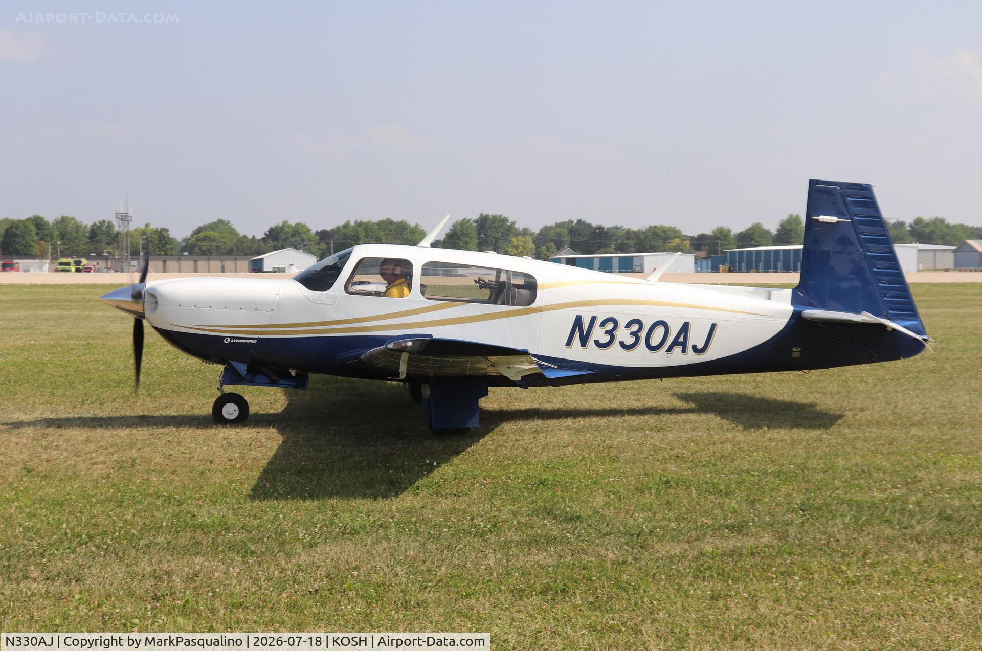 Aircraft N330AJ, 1989 Mooney M20M Bravo, c/n 27-0017, Mooney M20M, at KOSH, photo by MarkPasqualino