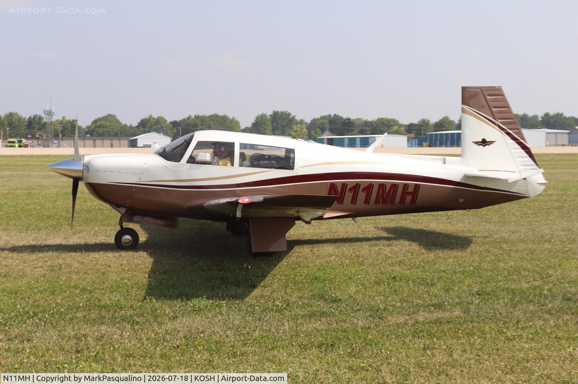 Aircraft N11MH, 1977 Mooney M20J 201, c/n 24-0157, Mooney M20J, at KOSH, photo by MarkPasqualino