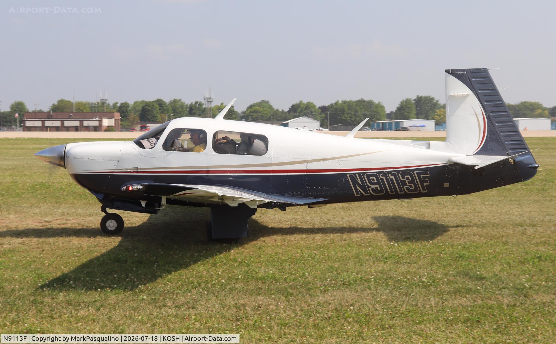 Aircraft N9113F, Mooney M20J 201, c/n 24-3180, Mooney M20J, at KOSH, photo by MarkPasqualino