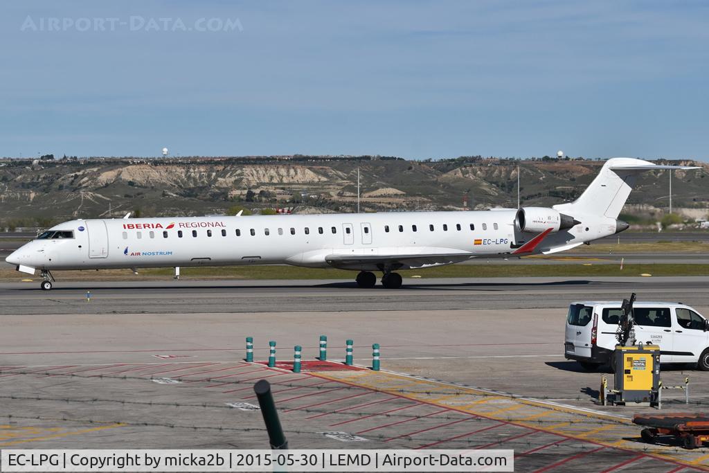 Aircraft EC-LPG, 2011 Bombardier CRJ-1000ER NG (CL-600-2E25), c/n 19021, Taxiing, with Air Nostrum title, at LEMD, photo by micka2b
