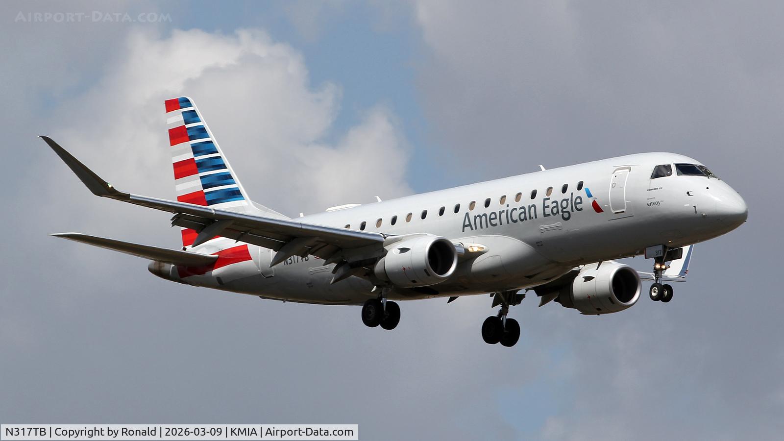 Aircraft N317TB, 2000 Airbus A319-112, c/n 1369, at mia, at KMIA, photo by Ronald