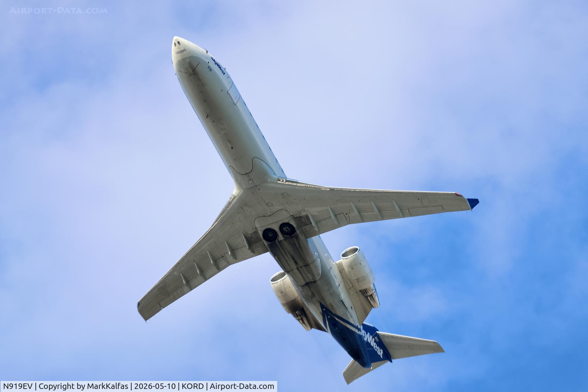 Aircraft N919EV, 2003 Bombardier CRJ-200ER (CL-600-2B19), c/n 7780, CRJ2 SkyWest/United Express Canadair Regional Jet CRJ-200 N919EV, departing 28R KORD, at KORD, photo by MarkKalfas