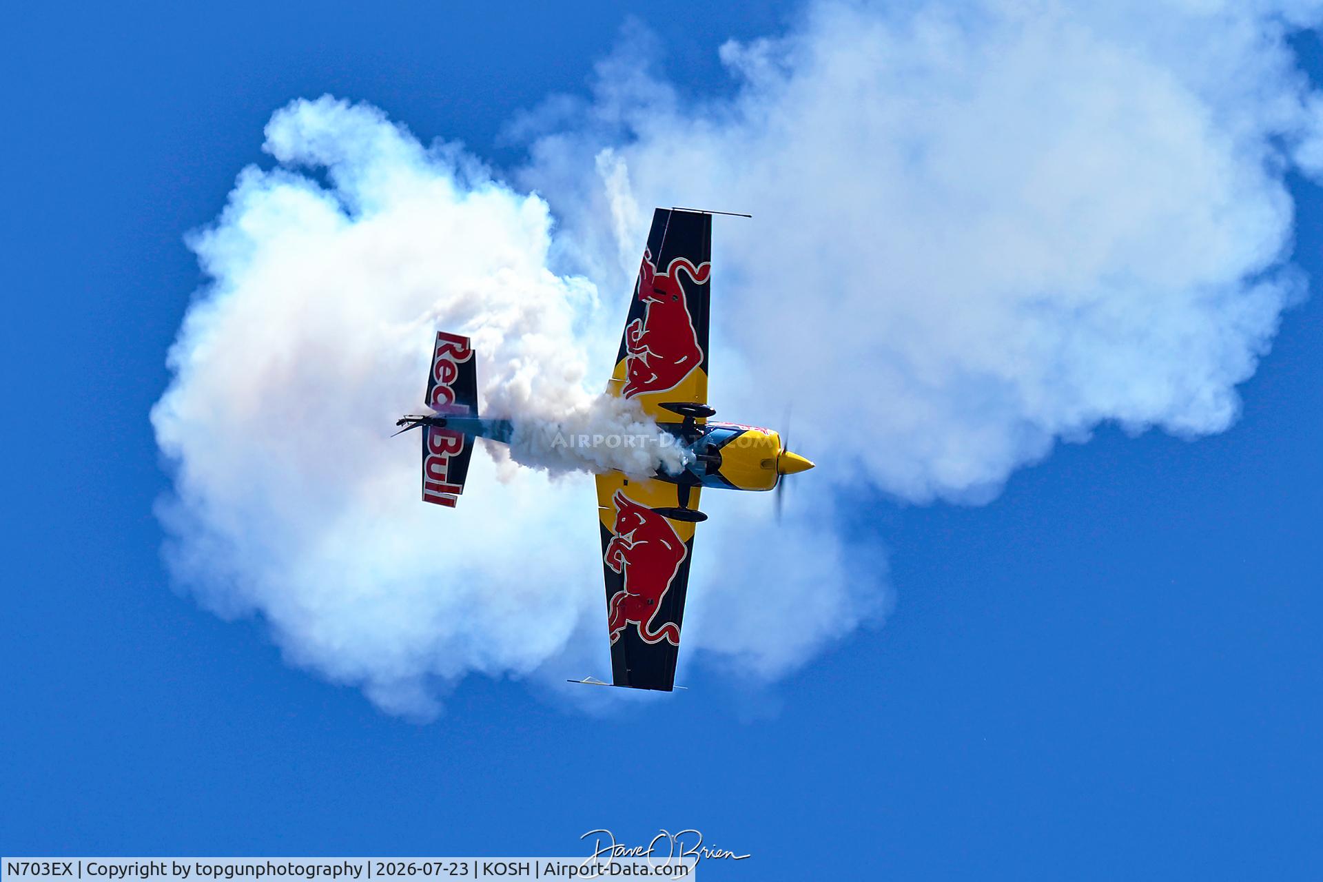 Aircraft N703EX, 2006 Extra EA-300S, c/n 1035, Red Bull Extra 300, at KOSH, photo by topgunphotography