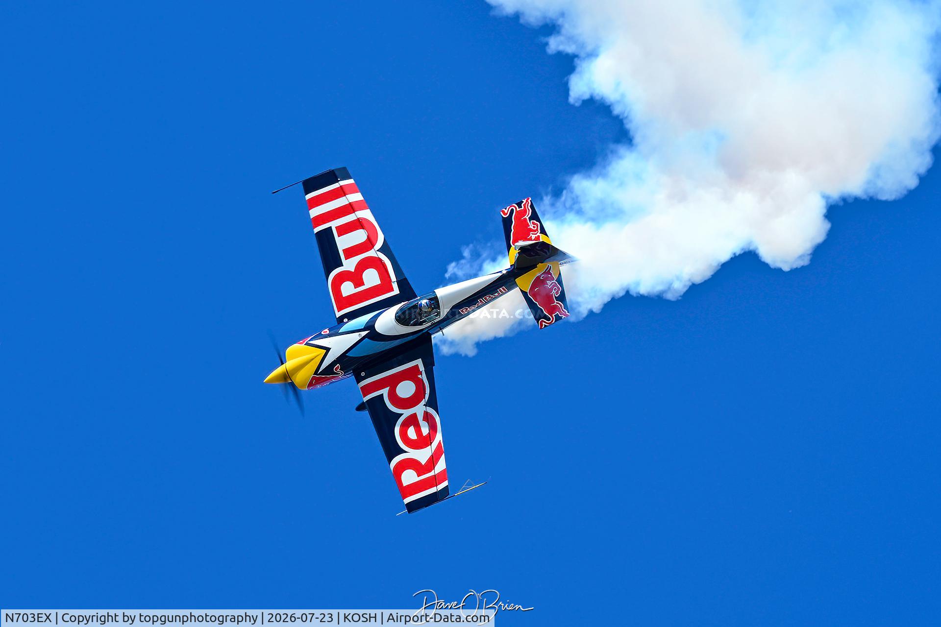Aircraft N703EX, 2006 Extra EA-300S, c/n 1035, Red Bull Extra 300, at KOSH, photo by topgunphotography