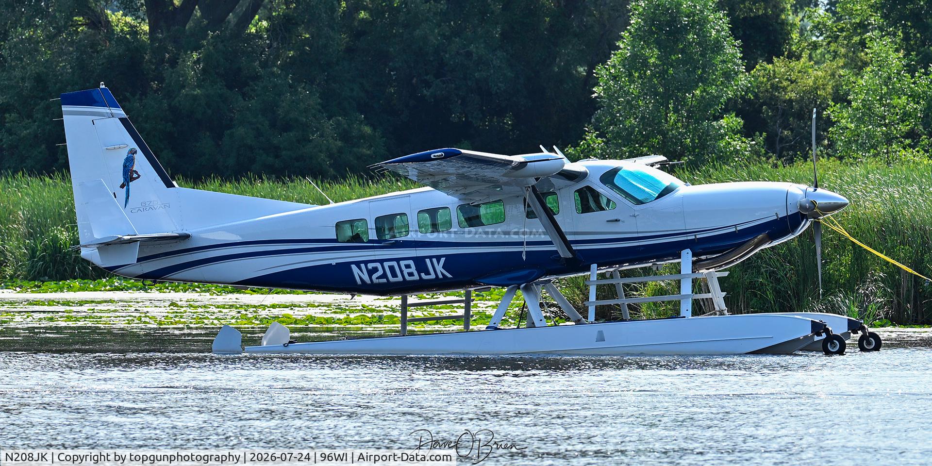 Aircraft N208JK, 1998 Cessna 208 Caravan I, c/n 20800281, Oshkosh 26 Seabase, at 96WI, photo by topgunphotography