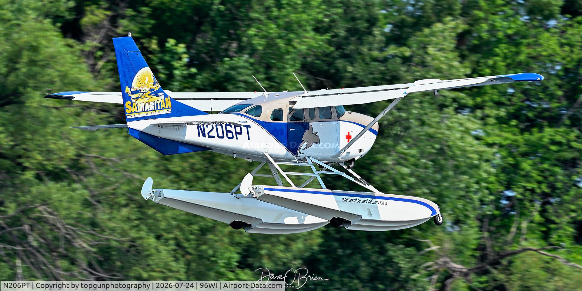 Aircraft N206PT, Cessna U206G Stationair, c/n U20605815, Floatplane landing Oshkosh 26, at 96WI, photo by topgunphotography