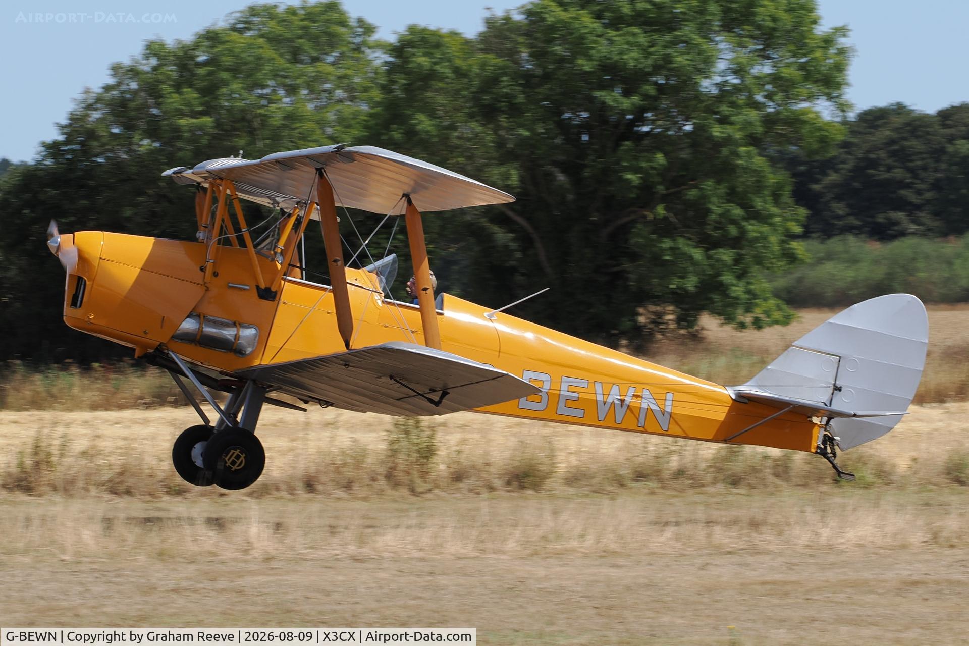 Aircraft G-BEWN, 1941 De Havilland Australia DH-82A Tiger Moth, c/n DHA952, Landing at Northrepps., at X3CX, photo by Graham Reeve