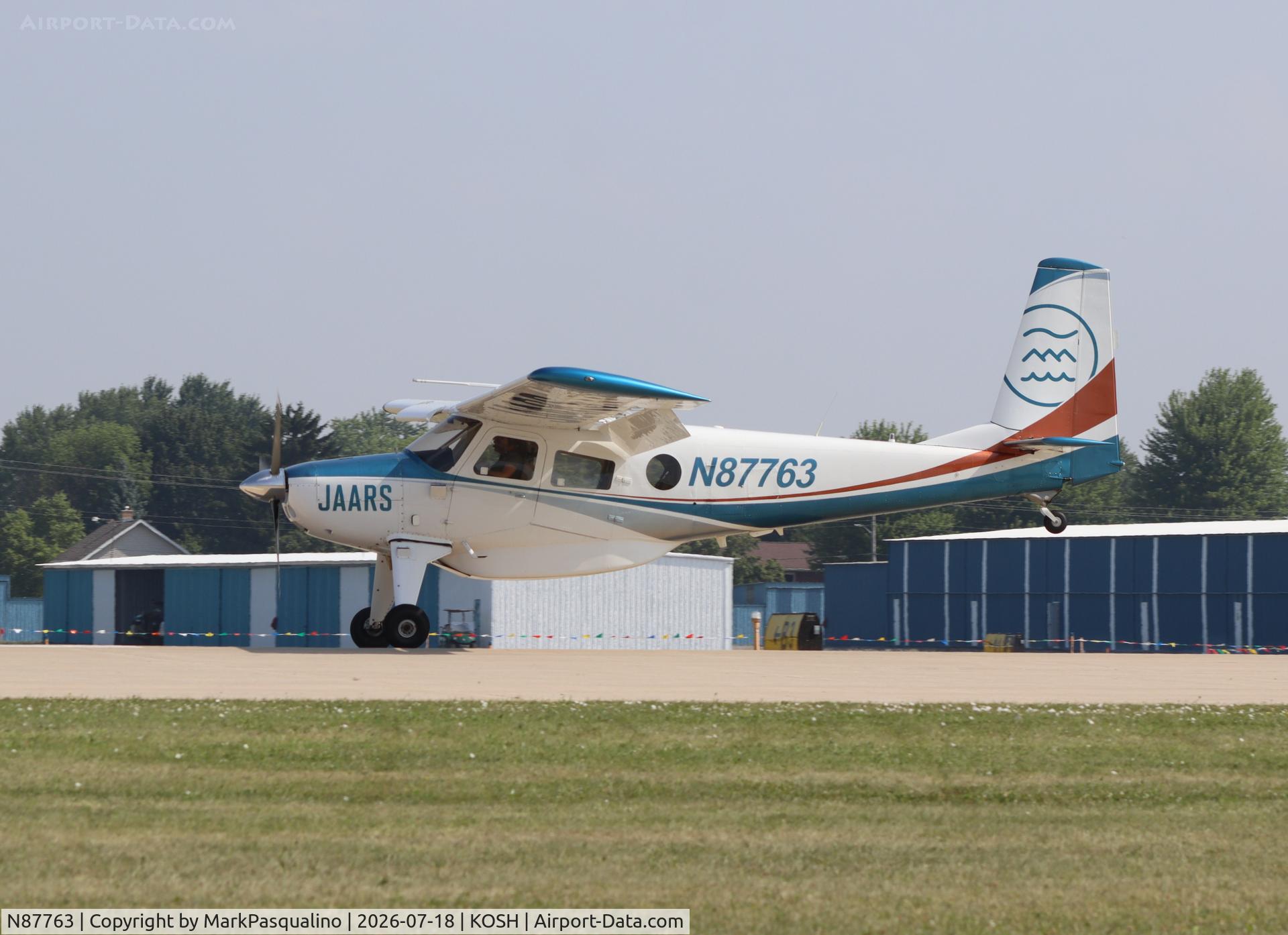 Aircraft N87763, Helio U-10B Super Courier, c/n 558, Helio U-10B Super Courier, at KOSH, photo by MarkPasqualino