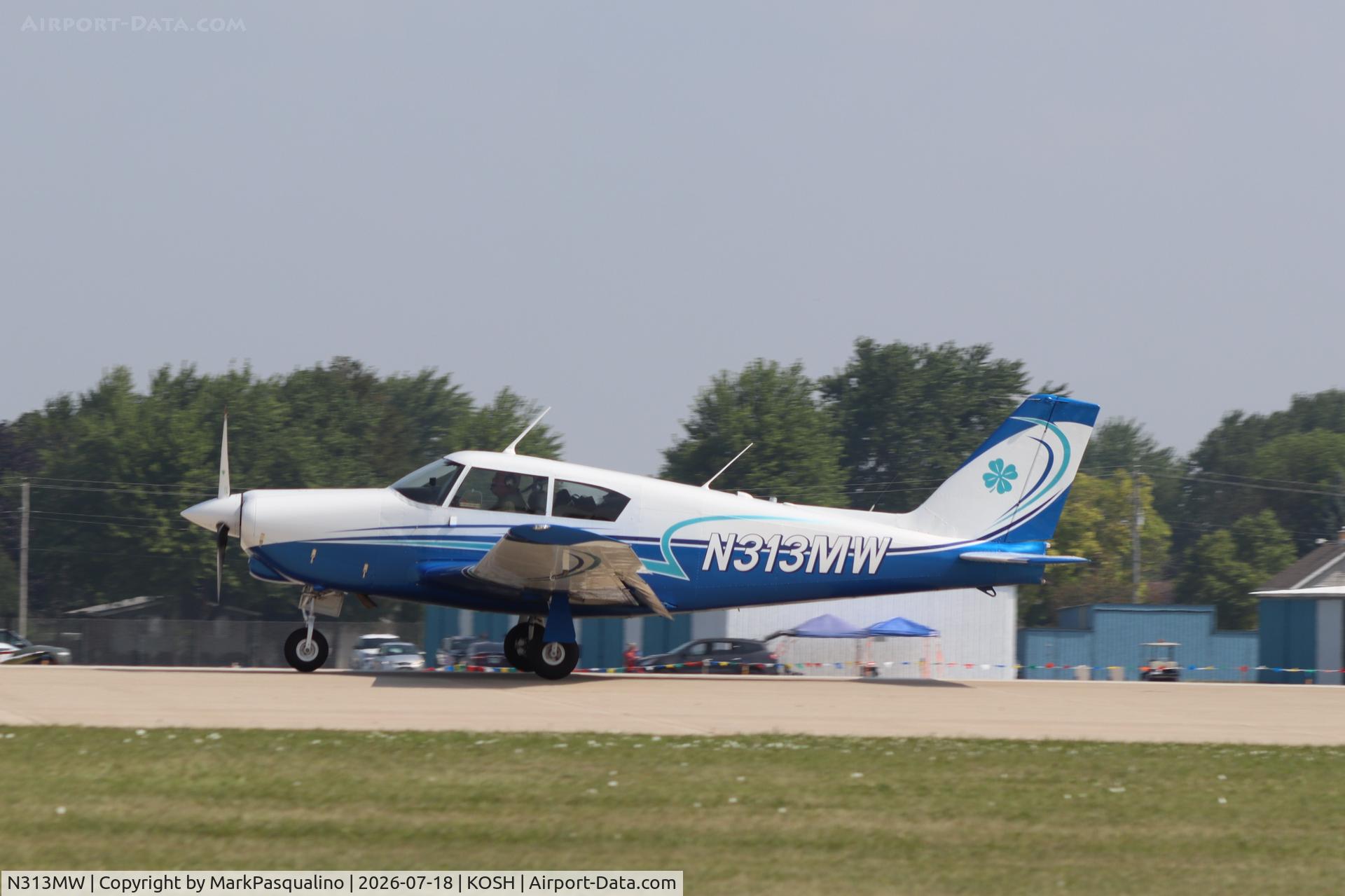 Aircraft N313MW, 1959 Piper PA-24-250 Comanche, c/n 24-1637, Piper PA-24-250, at KOSH, photo by MarkPasqualino