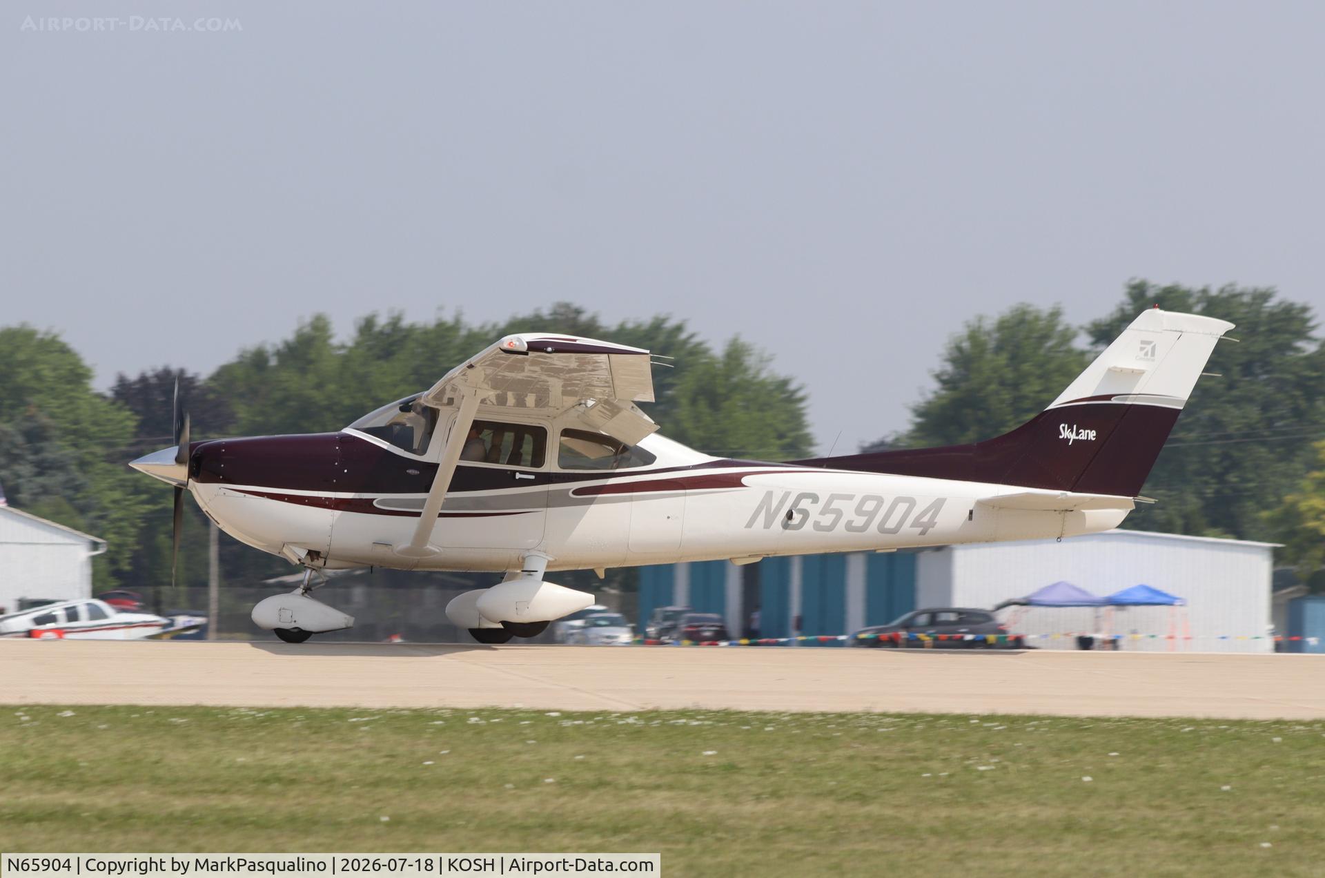 Aircraft N65904, 2004 Cessna 182T Skylane, c/n 18281502, Cessna 182T, at KOSH, photo by MarkPasqualino