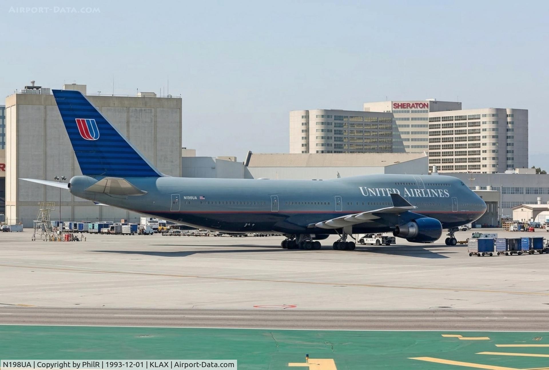 Aircraft N198UA, 1997 Boeing 747-422, c/n 28716, N198UA 1997 B747-400 United LAX, at KLAX, photo by PhilR