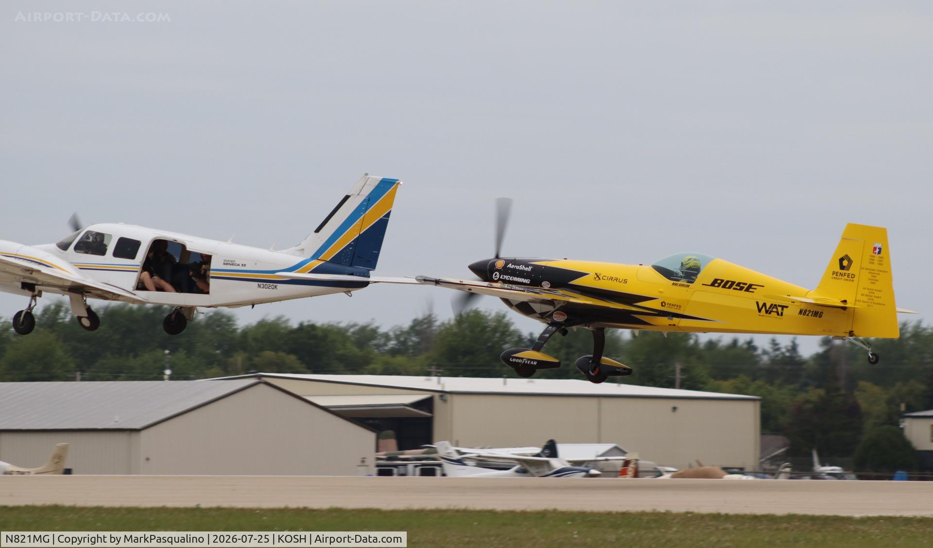 Aircraft N821MG, 2009 Extra EA-300SC, c/n SC010, Extra EA-300SC, at KOSH, photo by MarkPasqualino