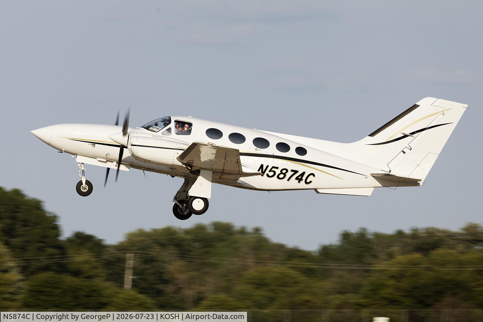 Aircraft N5874C, Cessna 421C Golden Eagle, c/n 421C0882, Airventure 2026., at KOSH, photo by GeorgeP