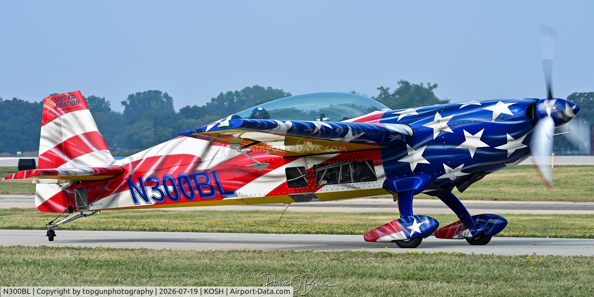 Aircraft N300BL, 1994 Extra EA-300, c/n 056, Oshkosh 26, at KOSH, photo by topgunphotography