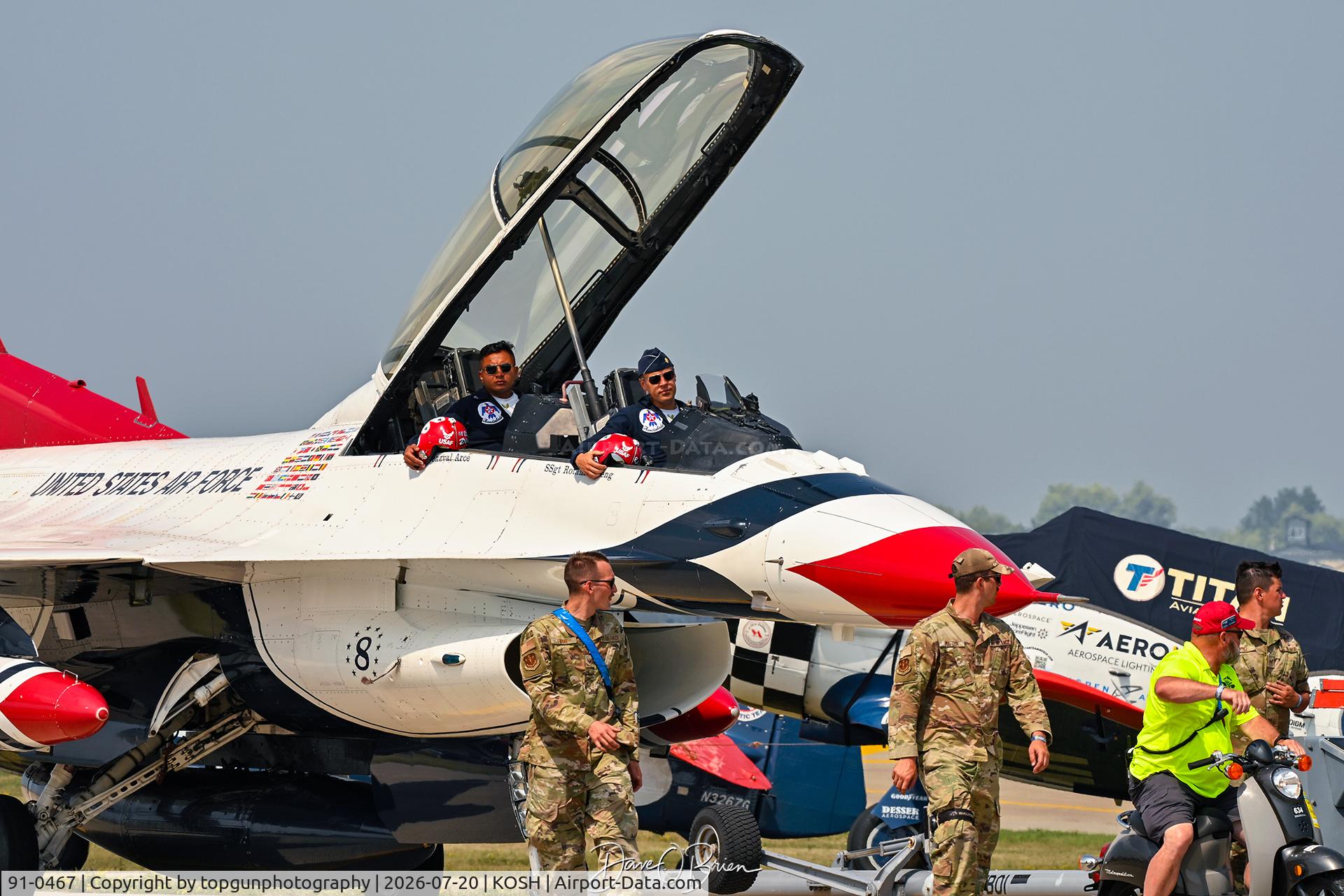 Aircraft 91-0467, General Dynamics F-16D Fighting Falcon, c/n CD-22, They parked this in the general aviation and RaZZ supposedly camped underneath it., at KOSH, photo by topgunphotography