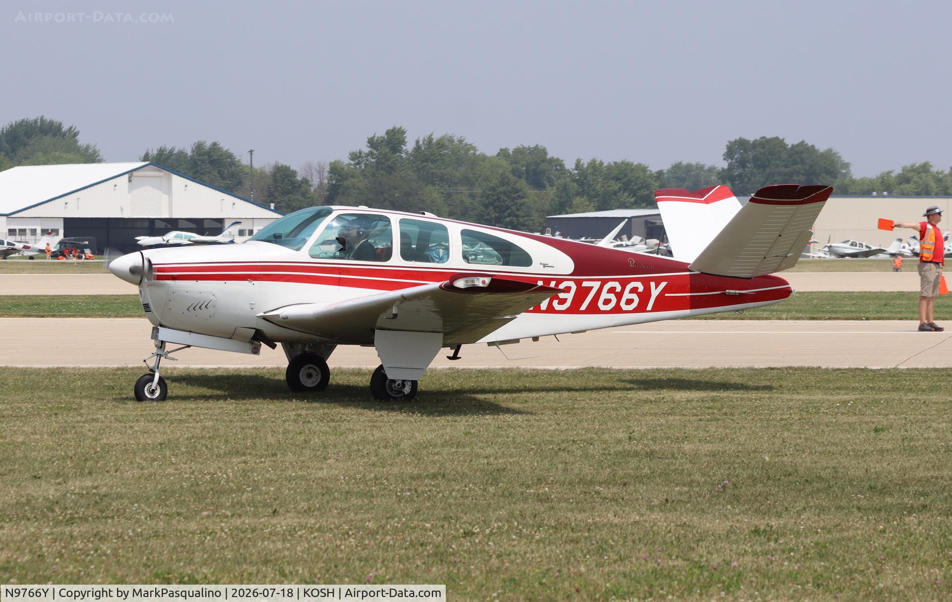 Aircraft N9766Y, 1963 Beech P35 Bonanza, c/n D-7152, Beech P35, at KOSH, photo by MarkPasqualino