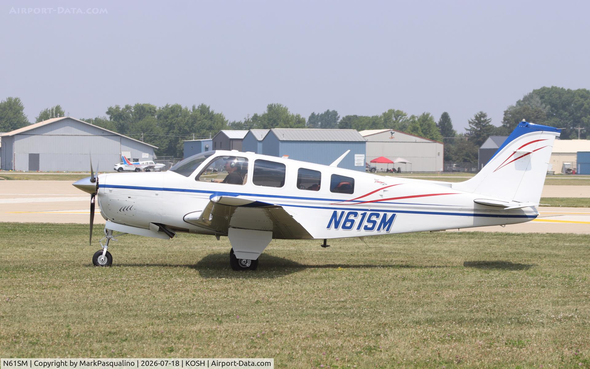 Aircraft N61SM, 1970 Beech A36 Bonanza 36, c/n E-199, Beech A36, at KOSH, photo by MarkPasqualino