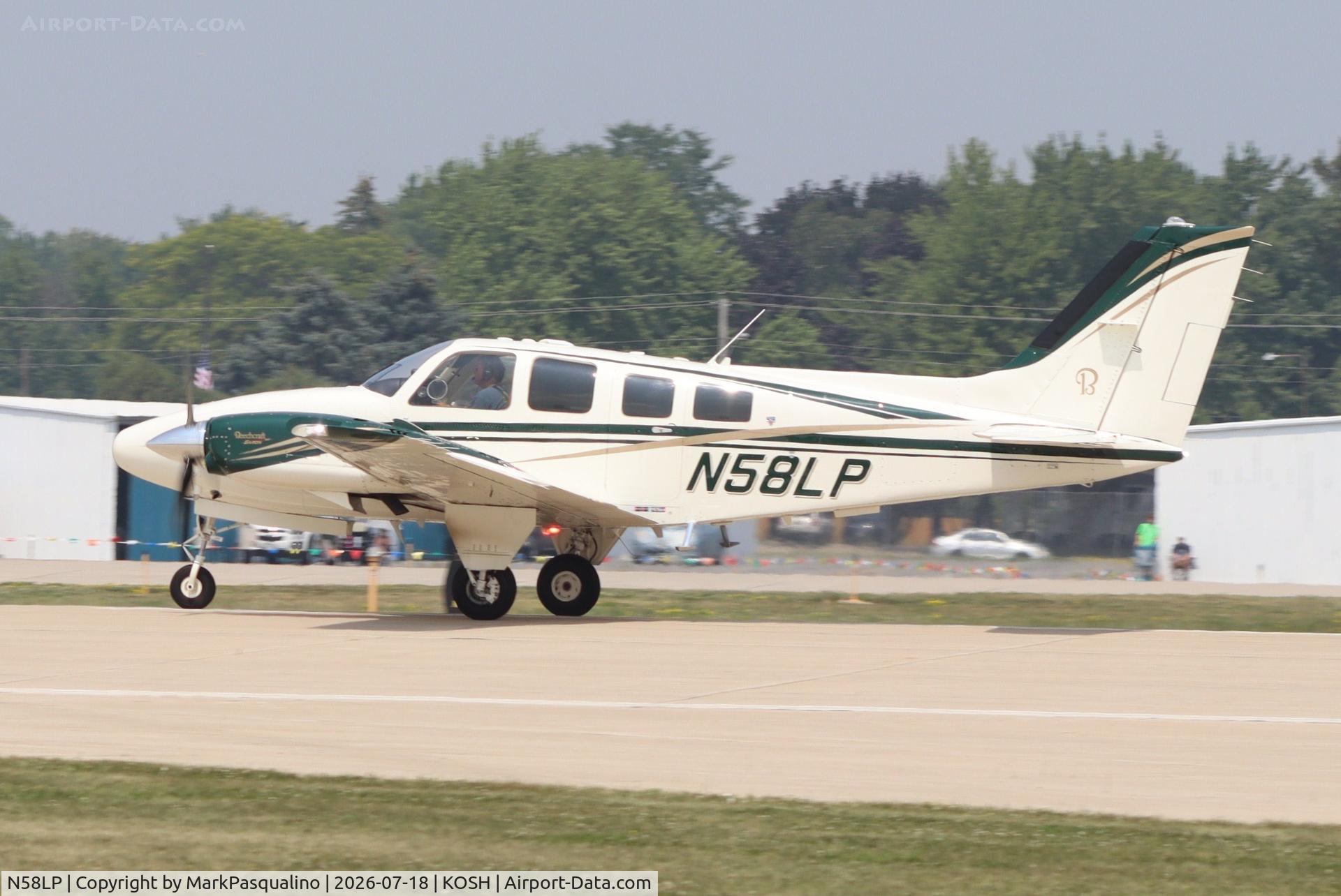Aircraft N58LP, 1985 Beech 58P Baron, c/n TJ-481, Beech 58P, at KOSH, photo by MarkPasqualino