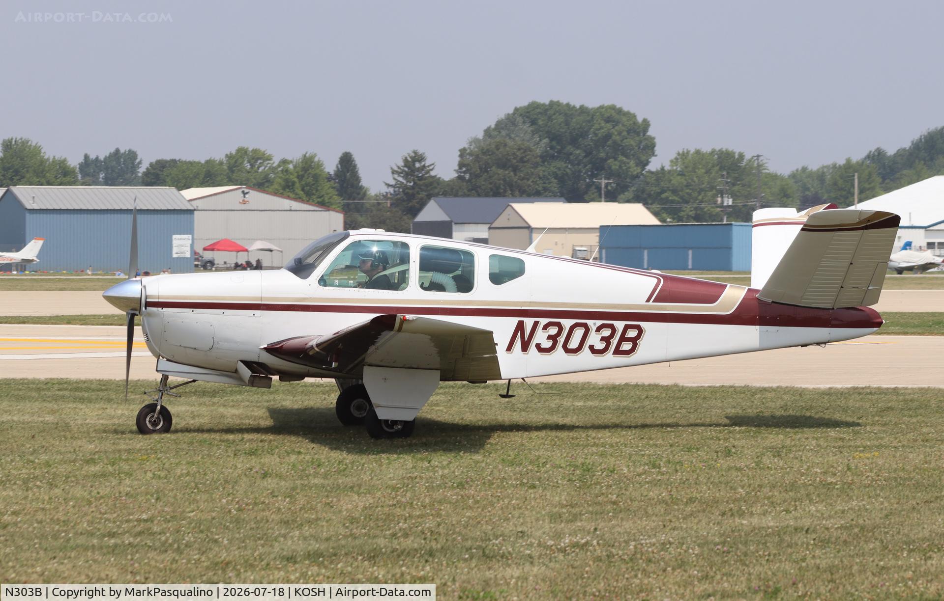 Aircraft N303B, 1956 Beech G35 Bonanza, c/n D-4707, Beech G35, at KOSH, photo by MarkPasqualino
