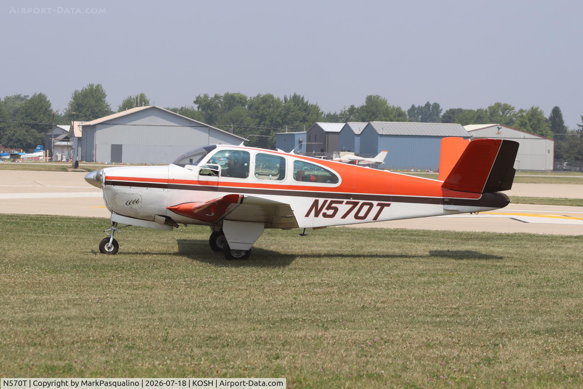 Aircraft N570T, 1961 Beech N35 Bonanza, c/n D-6747, Beech N35, at KOSH, photo by MarkPasqualino