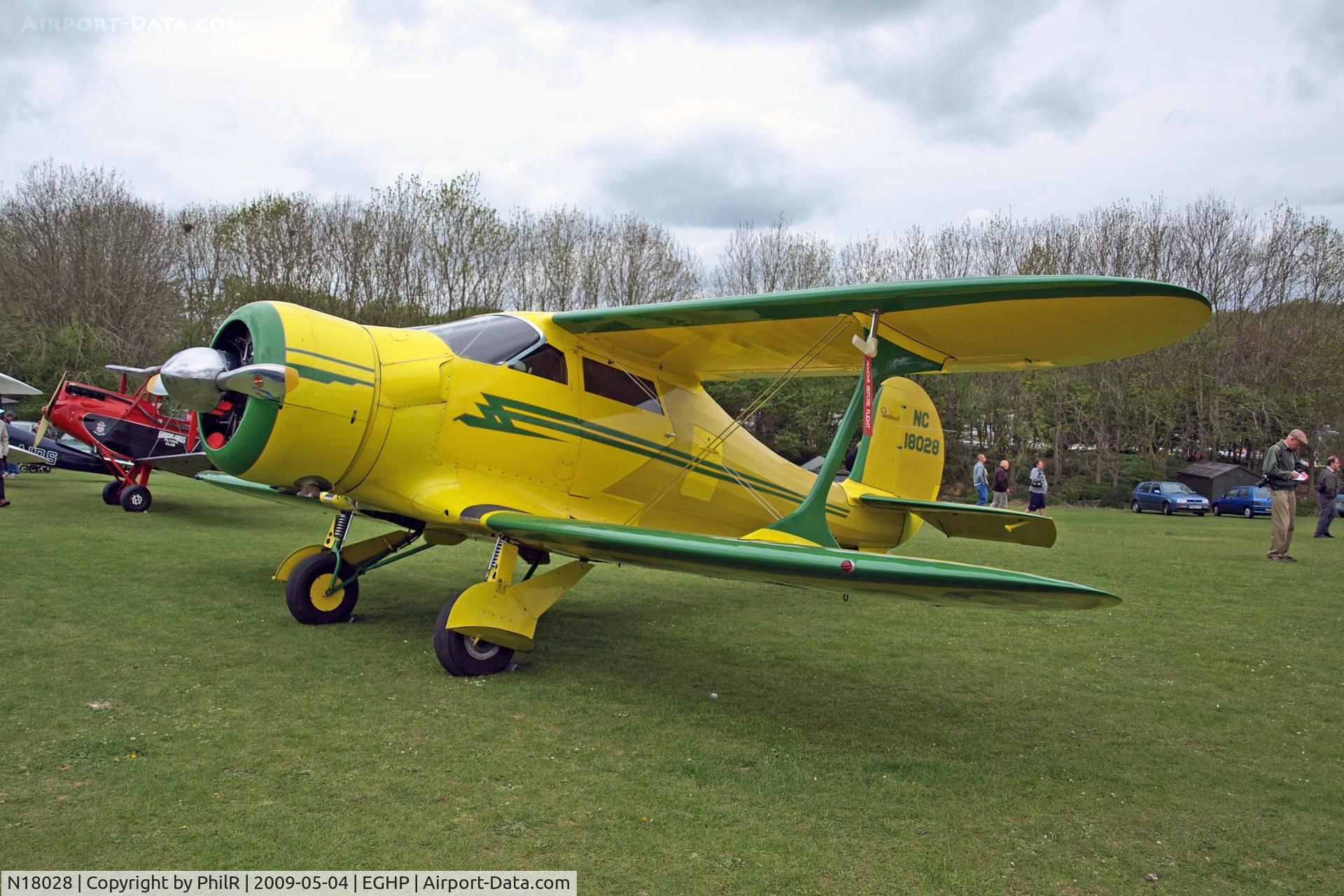 Aircraft N18028, 1937 Beech D17S Staggerwing, c/n 147, NC18028 1937 Beech D17S Staggerwing Popham, at EGHP, photo by PhilR