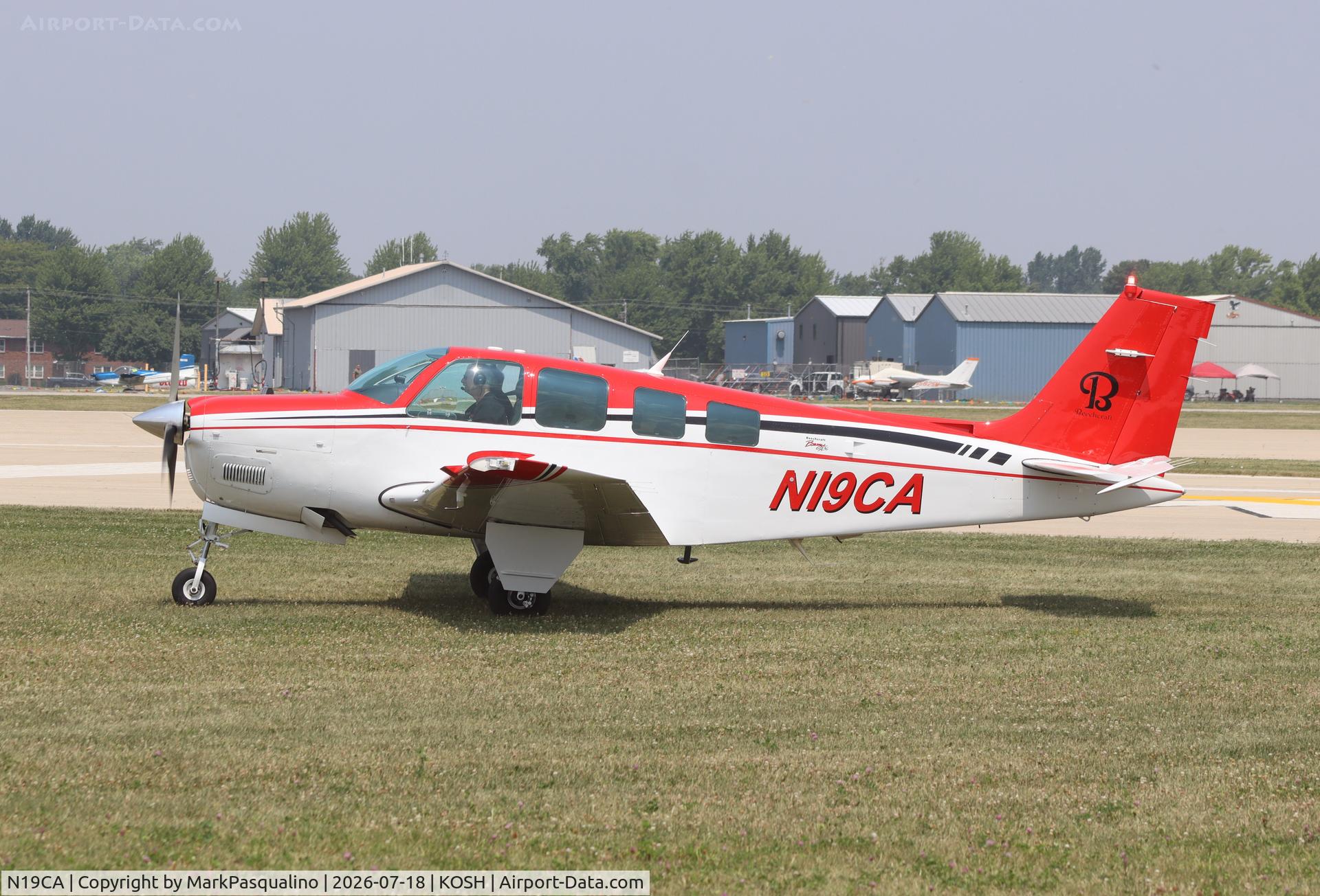 Aircraft N19CA, 1994 Beechcraft A36 Bonanza, c/n E-2877, Beech A36, at KOSH, photo by MarkPasqualino