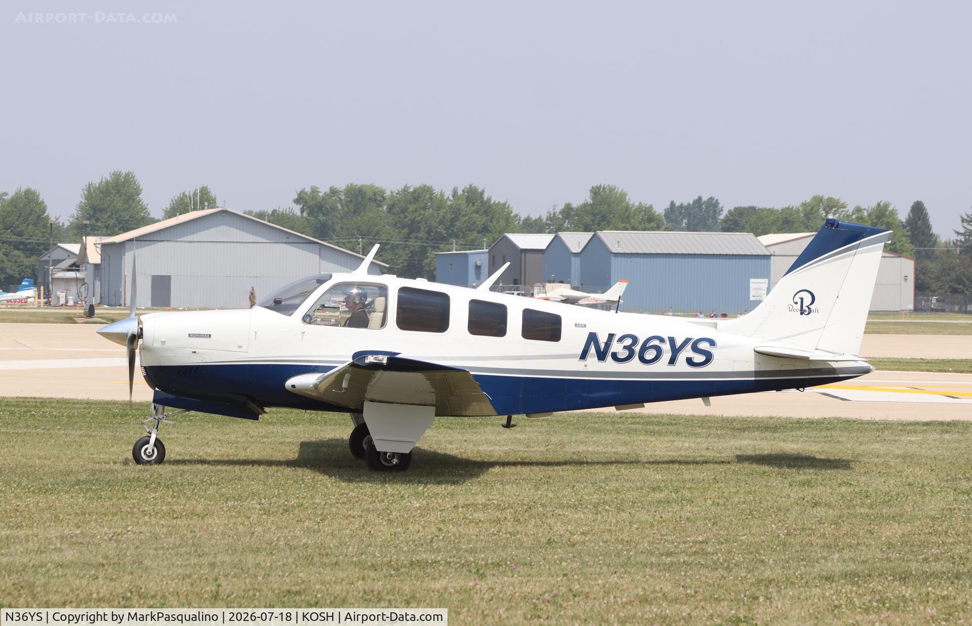 Aircraft N36YS, 1974 Beechcraft A36 Bonanza, c/n E-549, Beech A36, at KOSH, photo by MarkPasqualino