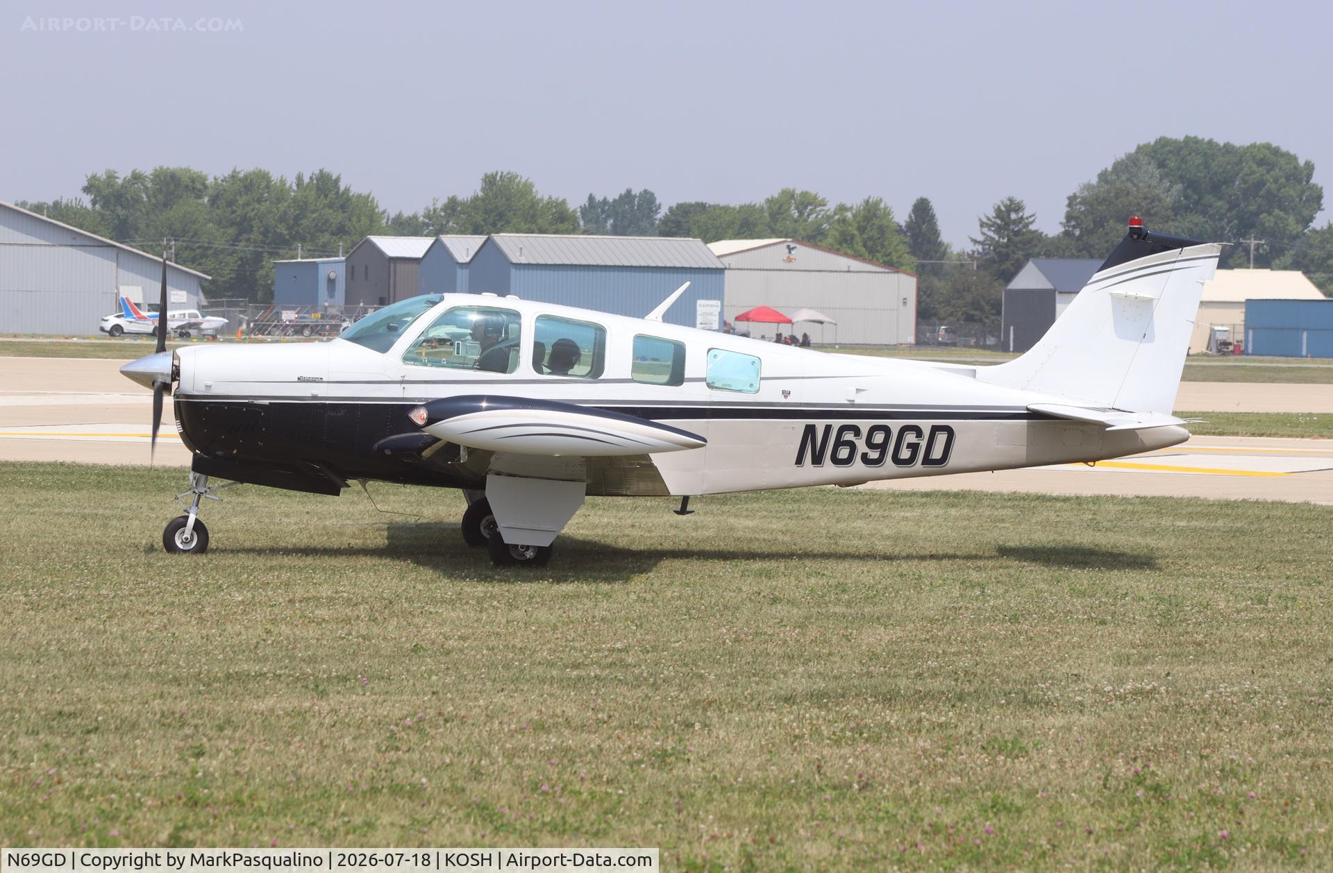 Aircraft N69GD, 1989 Beech A36 Bonanza 36, c/n E-2509, Beech A36, at KOSH, photo by MarkPasqualino