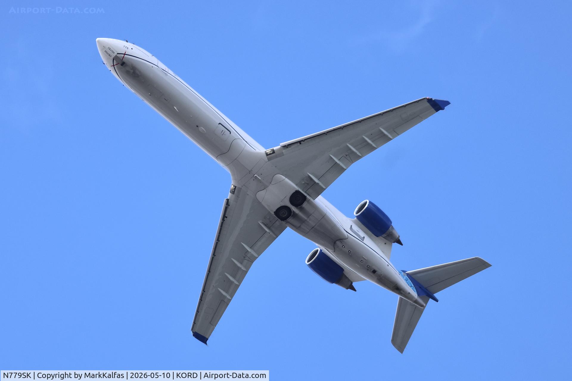 Aircraft N779SK, 2009 Bombardier CRJ-702 (CL-600-2C10) Regional Jet, c/n 10276, CRJ7 SkyWest / United Express Bombardier CRJ-701ER N779SK departing 28R KORD, at KORD, photo by MarkKalfas
