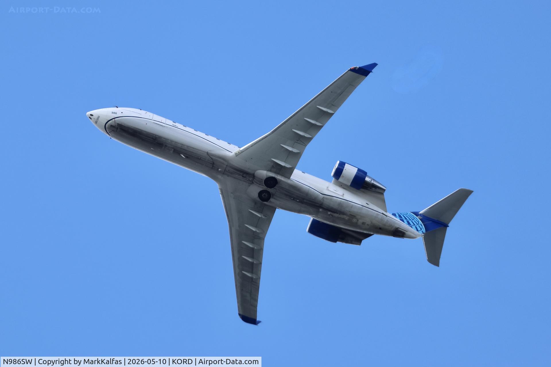 Aircraft N986SW, 2004 Bombardier CRJ-200ER (CL-600-2B19), c/n 7967, CRJ2 SkyWest / United Express Bombardier CRJ 200 N986SW departing 28R KORD, at KORD, photo by MarkKalfas