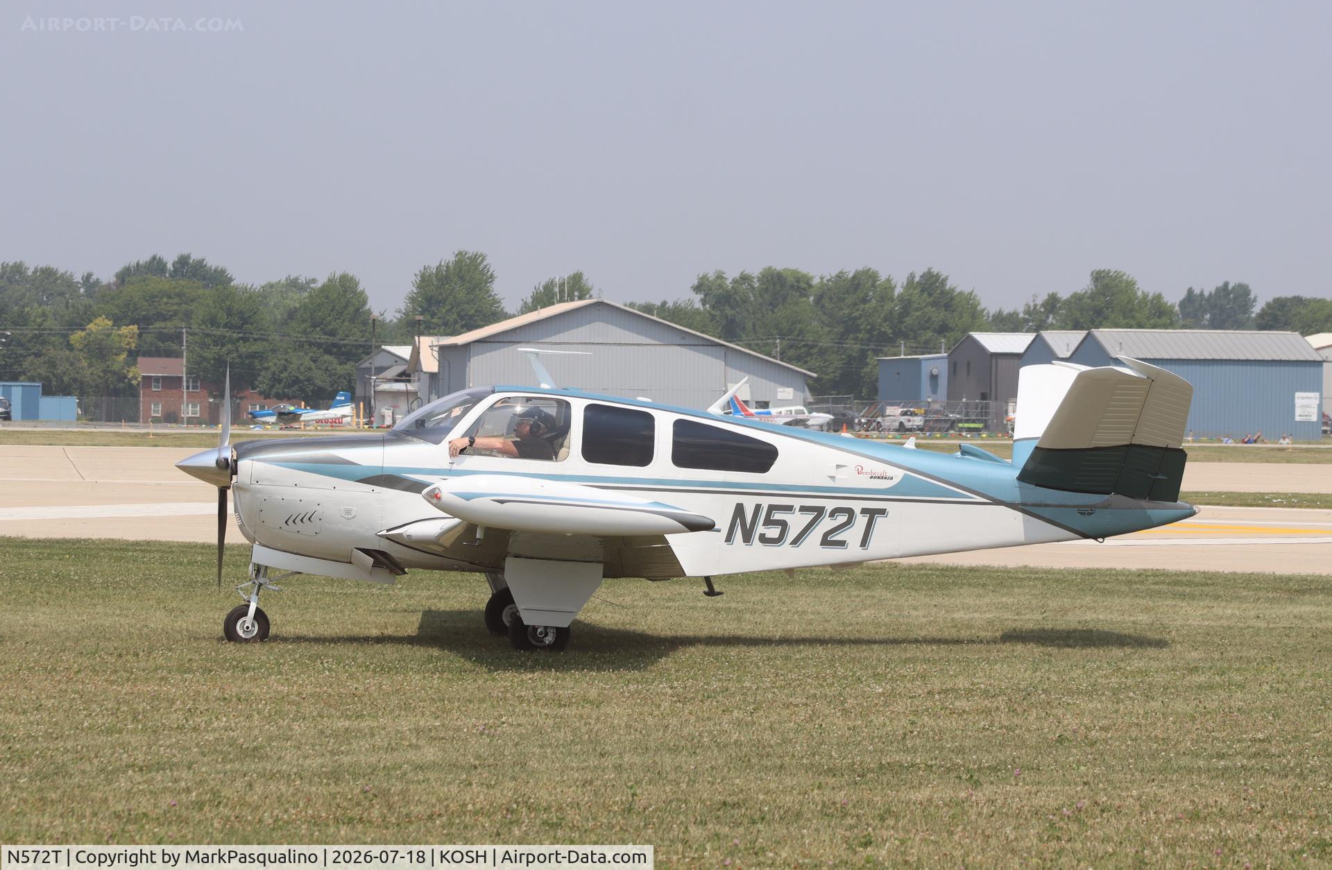Aircraft N572T, 1964 Beech S35 Bonanza, c/n D-7400, Beech S35, at KOSH, photo by MarkPasqualino