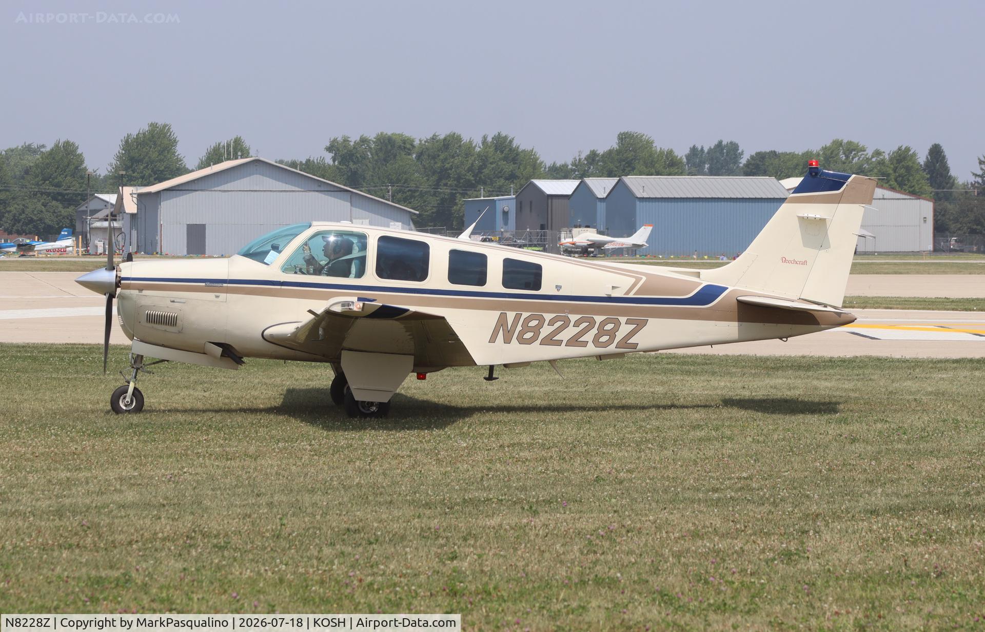 Aircraft N8228Z, 1993 Beech A36 Bonanza 36, c/n E-2800, Beech A36, at KOSH, photo by MarkPasqualino