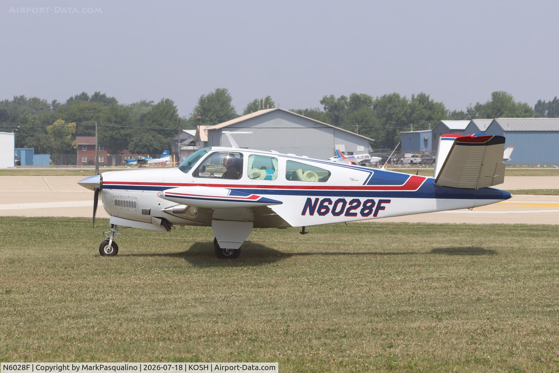 Aircraft N6028F, 1965 Beech S35 Bonanza, c/n D-7808, Beech S35, at KOSH, photo by MarkPasqualino