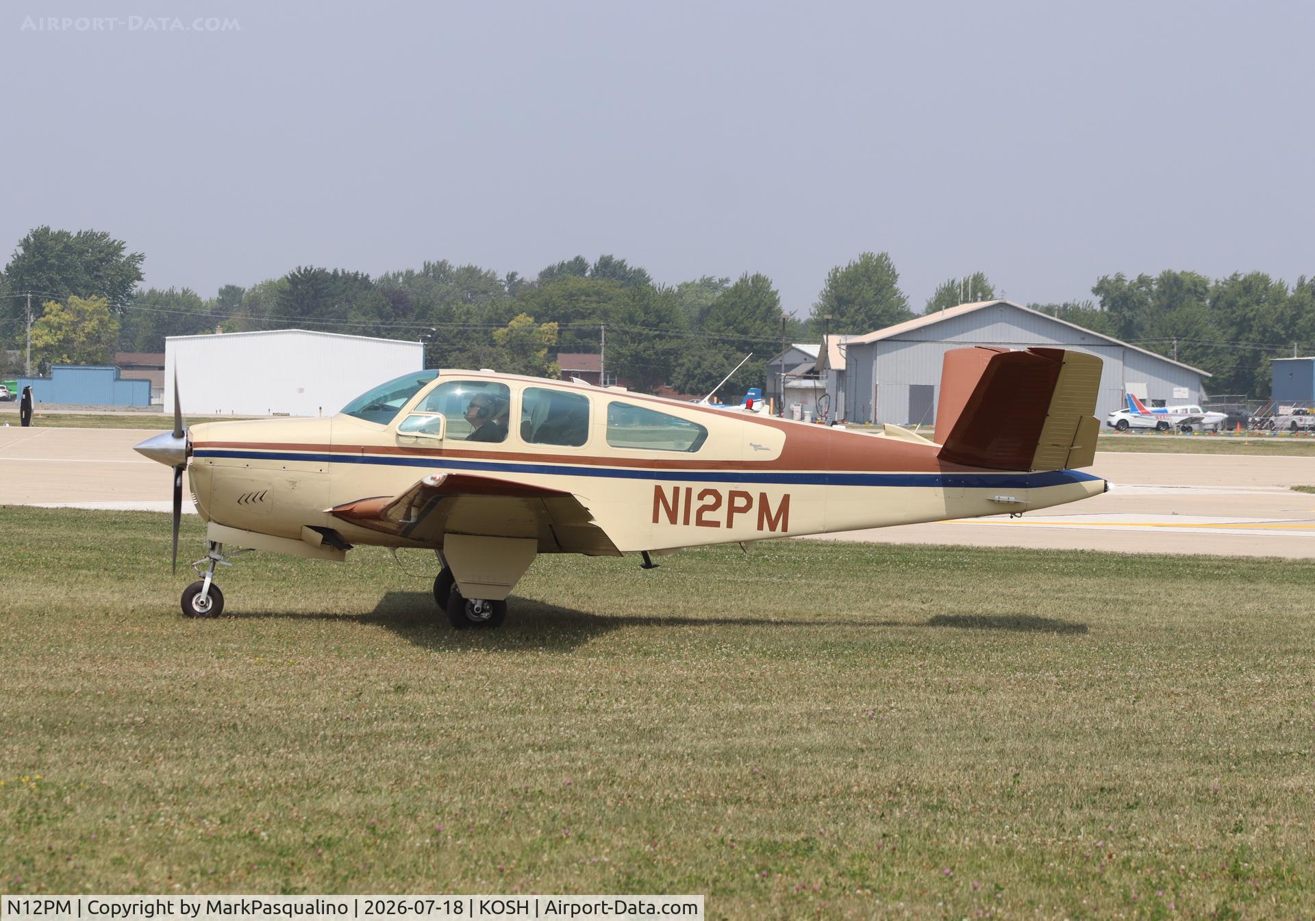 Aircraft N12PM, 1964 Beech S35 Bonanza, c/n D-7514, Beech S35, at KOSH, photo by MarkPasqualino