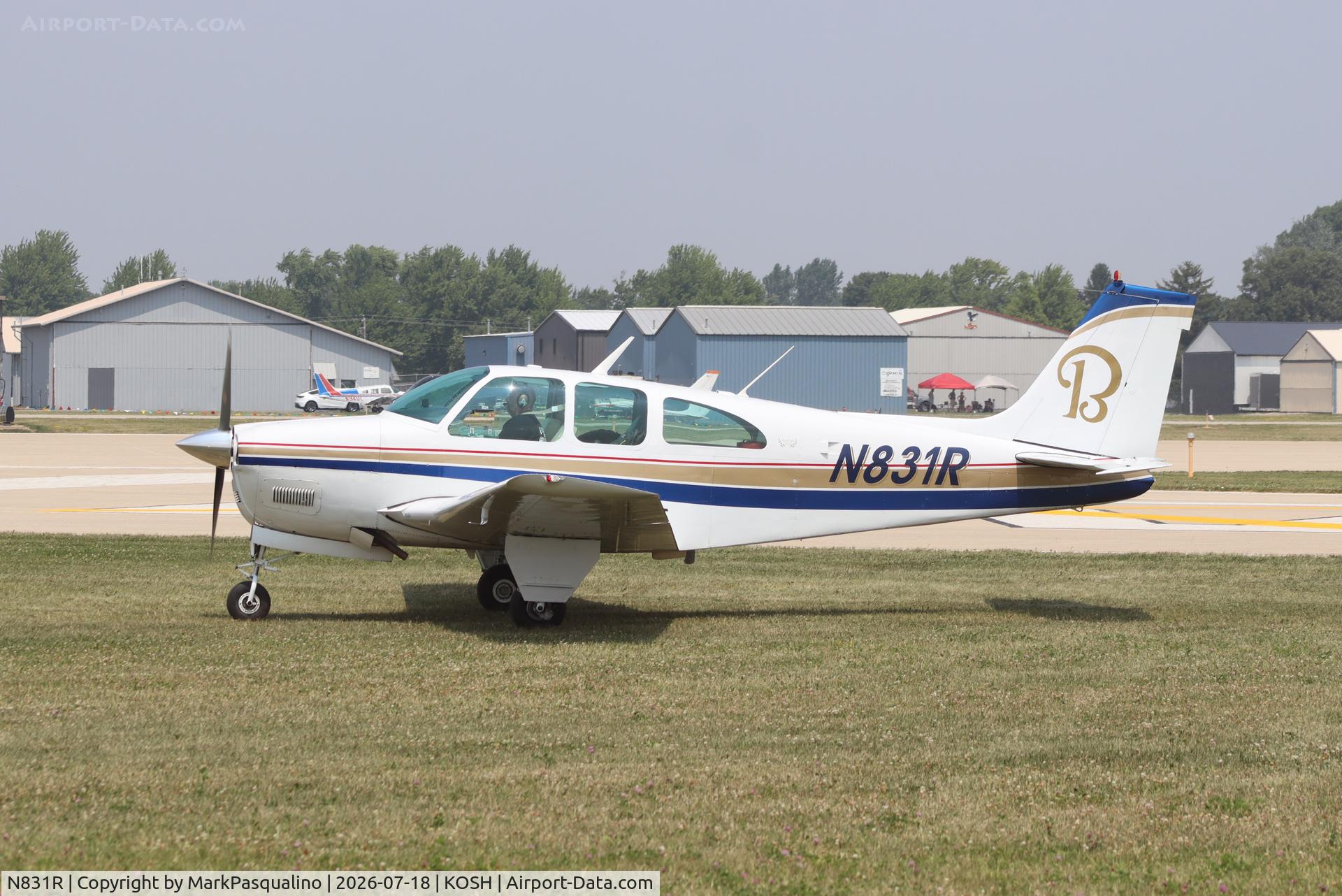 Aircraft N831R, 1959 Beech 35-33 Debonair, c/n CD-3, Beech 33, at KOSH, photo by MarkPasqualino