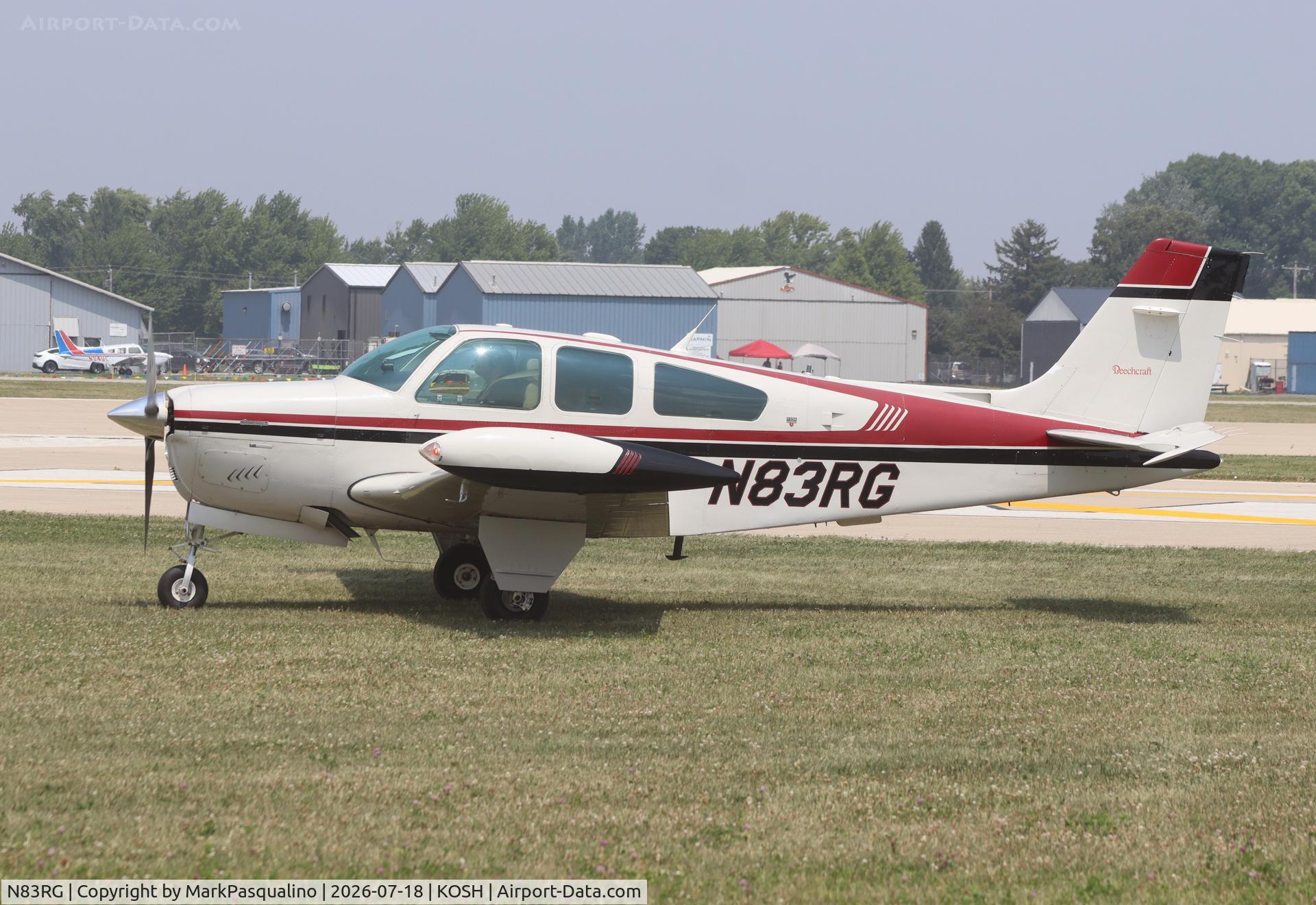 Aircraft N83RG, 1987 Beech F33A Bonanza, c/n CE-1205, Beech F33A, at KOSH, photo by MarkPasqualino