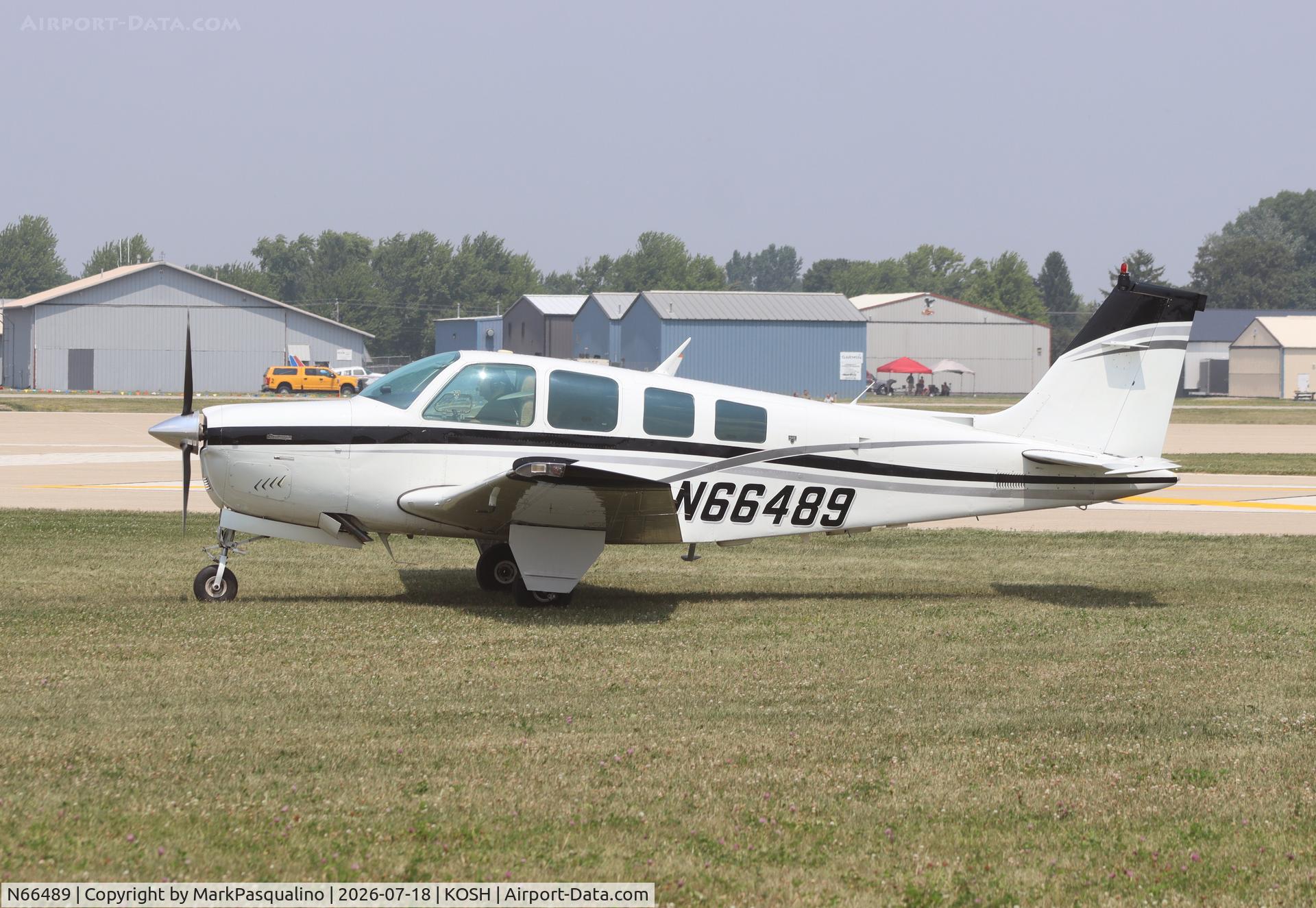 Aircraft N66489, 1983 Beech A36 Bonanza 36, c/n E-2073, Beech A36, at KOSH, photo by MarkPasqualino