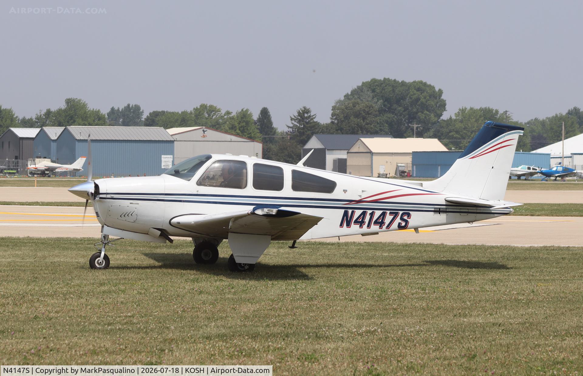 Aircraft N4147S, 1975 Beech F33A Bonanza, c/n CE-565, Beech F33A, at KOSH, photo by MarkPasqualino