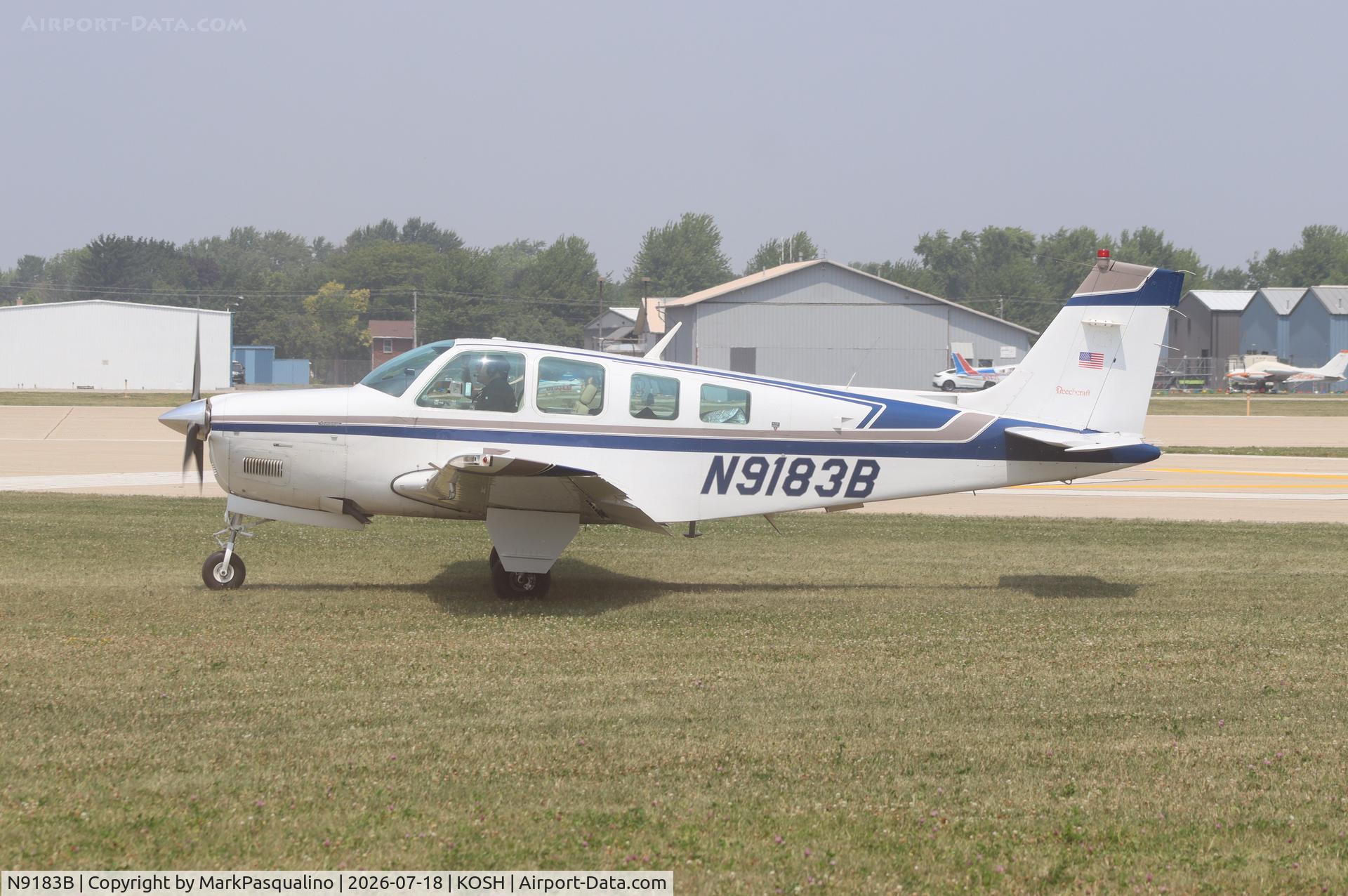 Aircraft N9183B, 1991 Beech A36 Bonanza 36, c/n E-2631, Beech A36, at KOSH, photo by MarkPasqualino