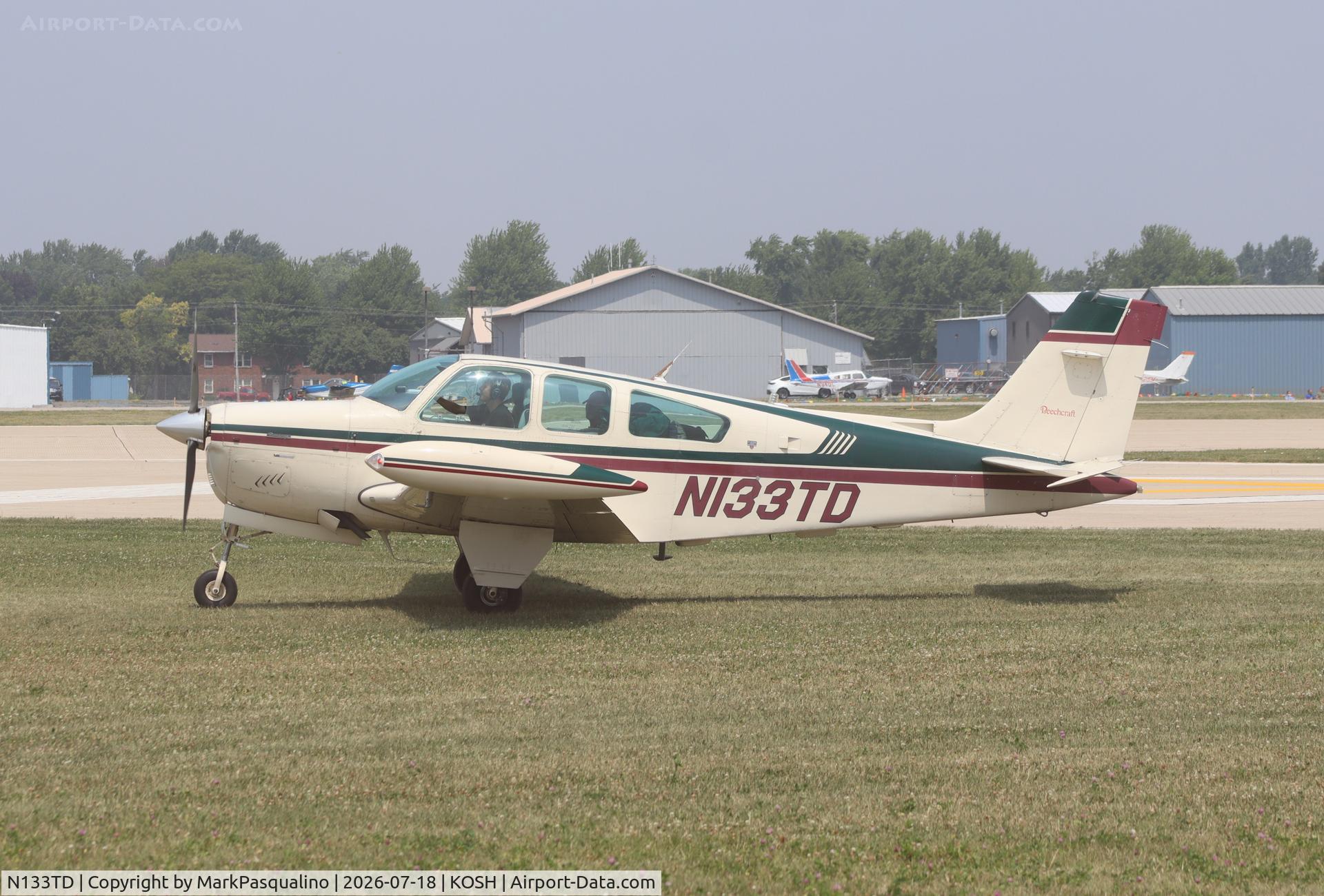 Aircraft N133TD, 1990 Beech F33A Bonanza, c/n CE-1548, Beech F33A, at KOSH, photo by MarkPasqualino