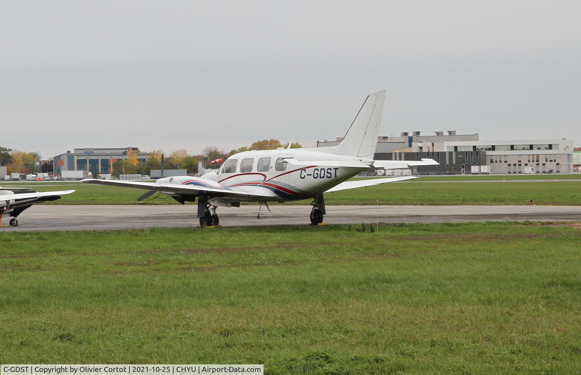 Aircraft C-GDST, 1976 Piper PA-31 Turbo Navajo C, c/n 31-7612060, 2021, at CHYU, photo by Olivier Cortot