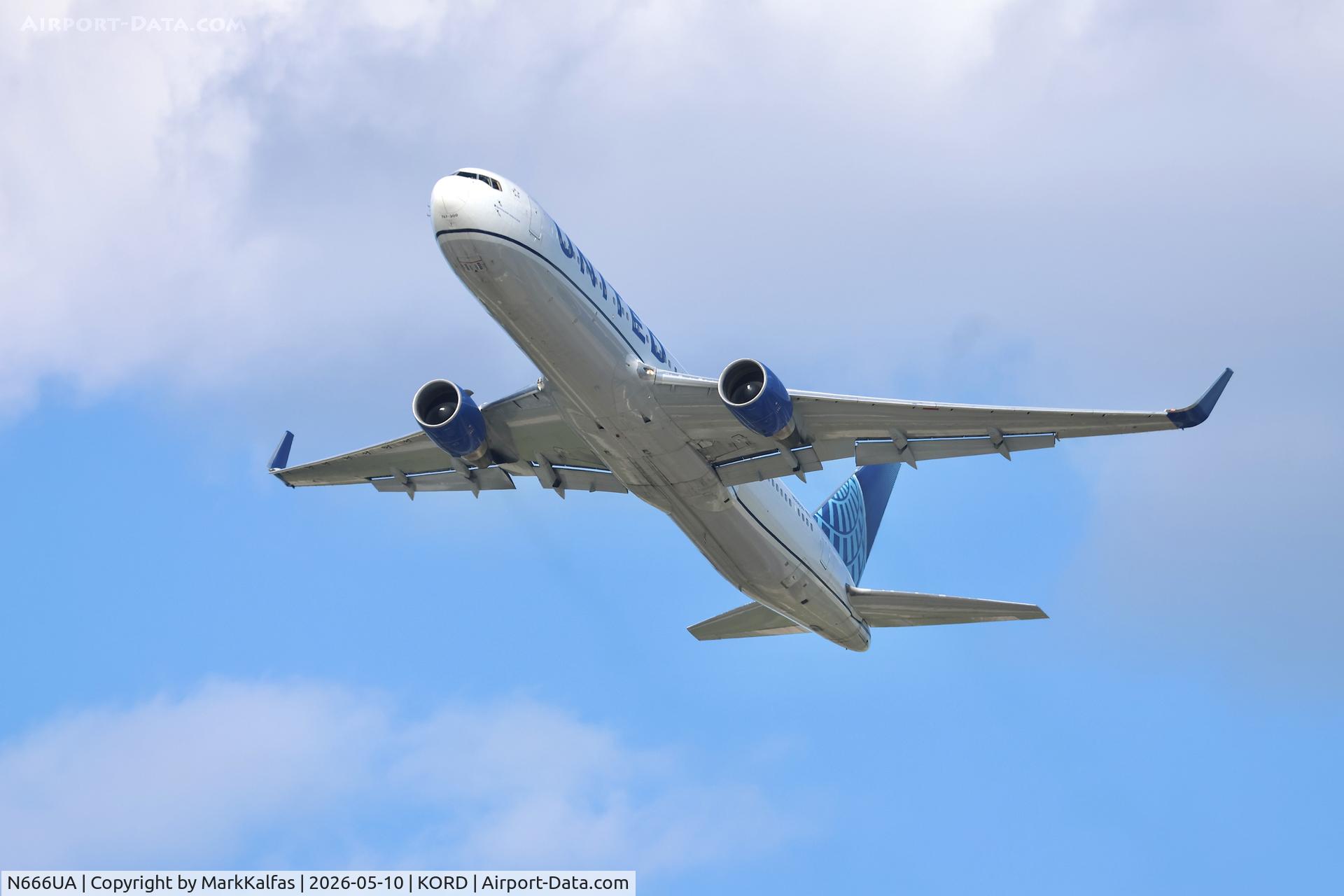 Aircraft N666UA, 1998 Boeing 767-322, c/n 29238, B763 United Airlines Boeing 767-322 N666UA departing 28R KORD, at KORD, photo by MarkKalfas