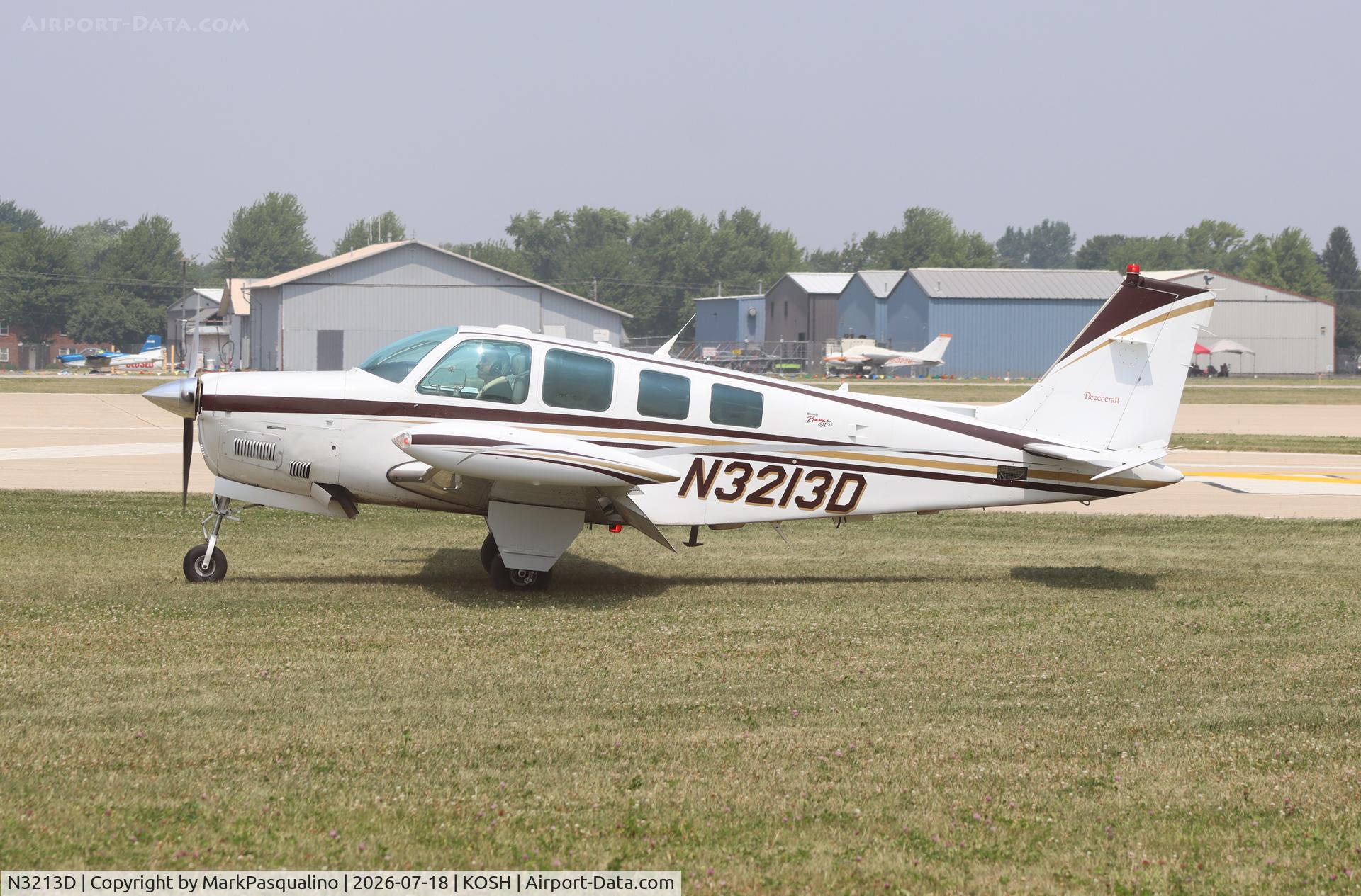 Aircraft N3213D, 1998 Raytheon Aircraft Company A36 Bonanza, c/n E3213, Beech A36, at KOSH, photo by MarkPasqualino