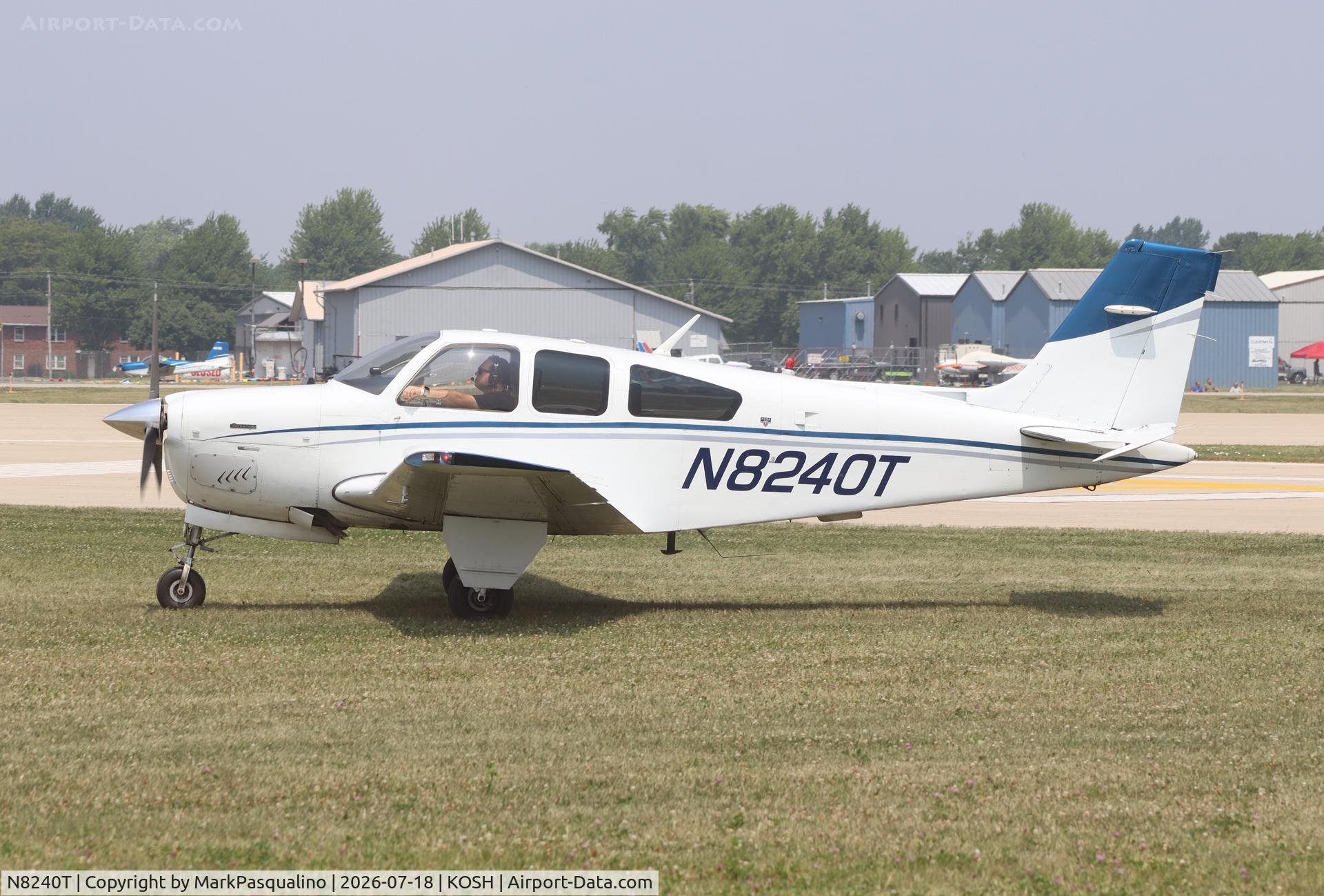 Aircraft N8240T, 1990 Beech F33A Bonanza, c/n CE-1542, Beech F33A, at KOSH, photo by MarkPasqualino