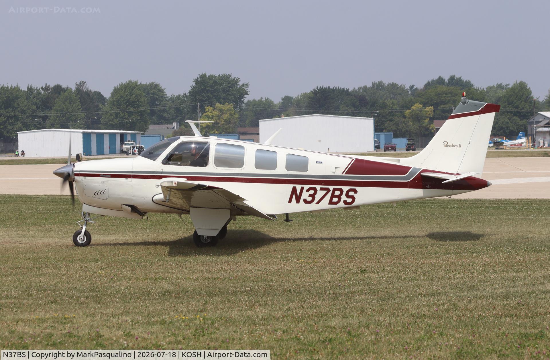 Aircraft N37BS, 1974 Beech A36 Bonanza 36, c/n E-548, Beech A36, at KOSH, photo by MarkPasqualino