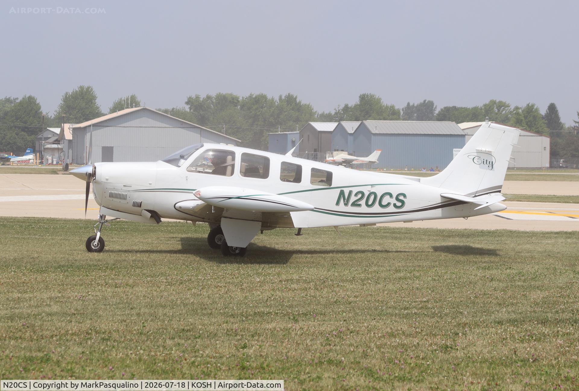 Aircraft N20CS, Raytheon Aircraft Company A36 Bonanza, c/n E-3601, Beech A36, at KOSH, photo by MarkPasqualino