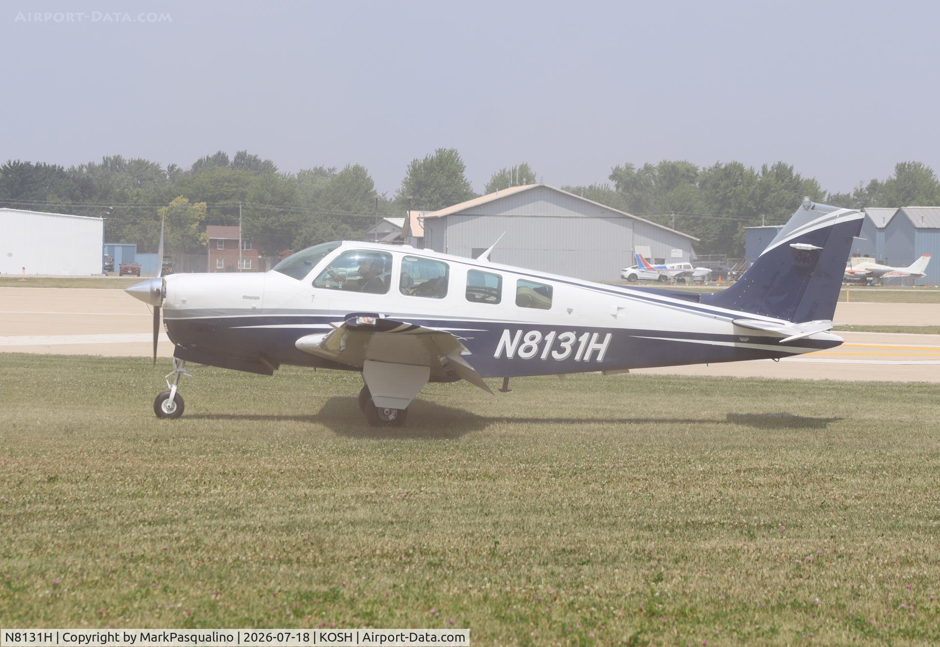Aircraft N8131H, 1992 Beech A36 Bonanza 36, c/n E-2755, Beech A36, at KOSH, photo by MarkPasqualino