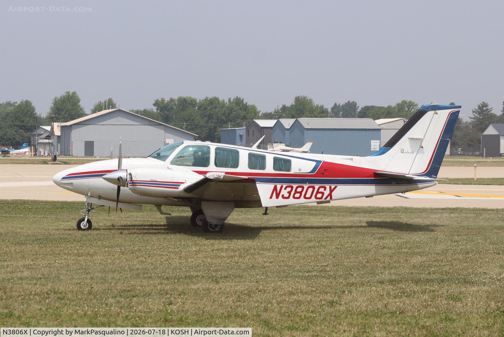 Aircraft N3806X, 1980 Beech 58 Baron, c/n TH-1215, Beech 58, at KOSH, photo by MarkPasqualino