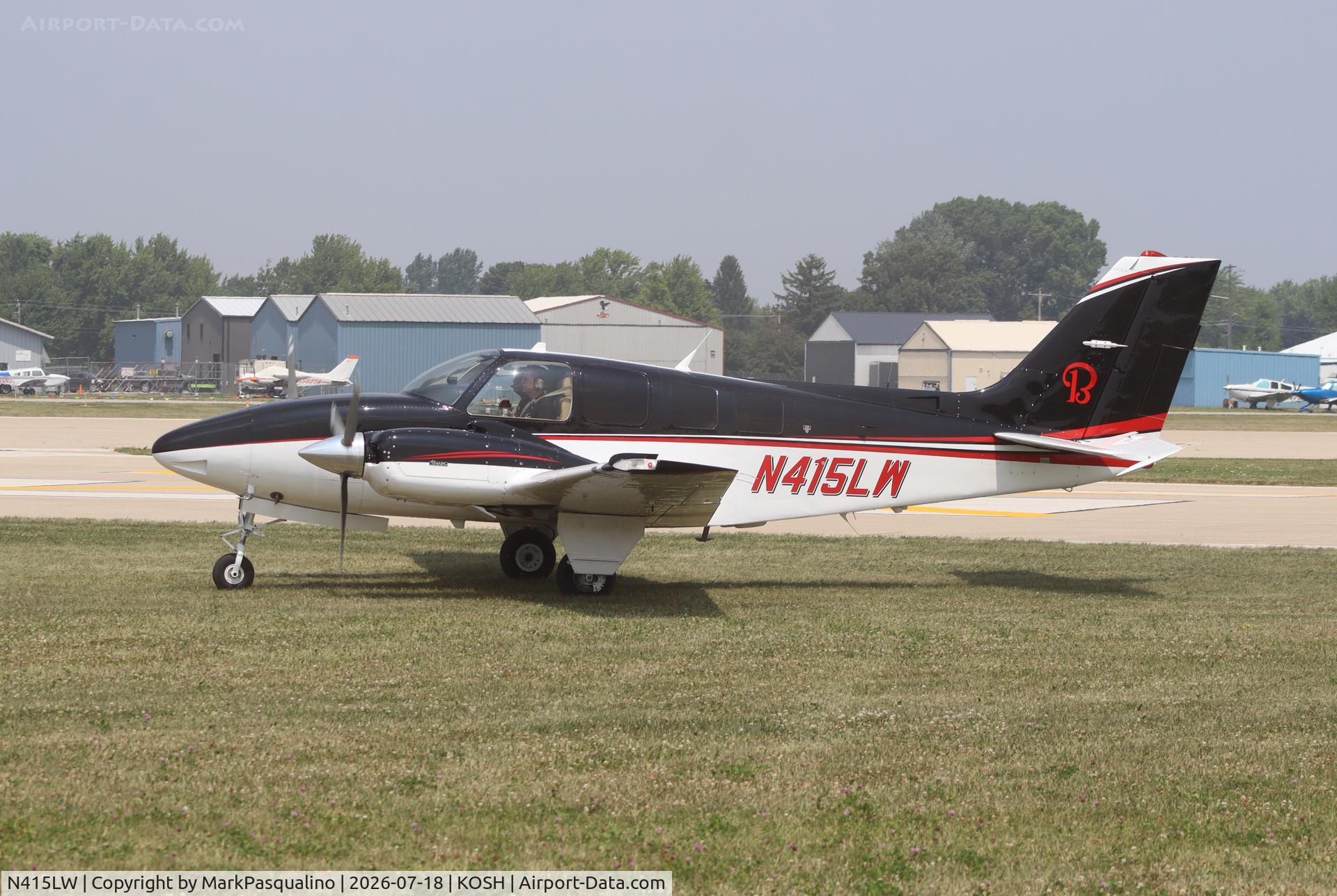 Aircraft N415LW, 1984 Beech 58 Baron, c/n TH-1417, Beech 58, at KOSH, photo by MarkPasqualino
